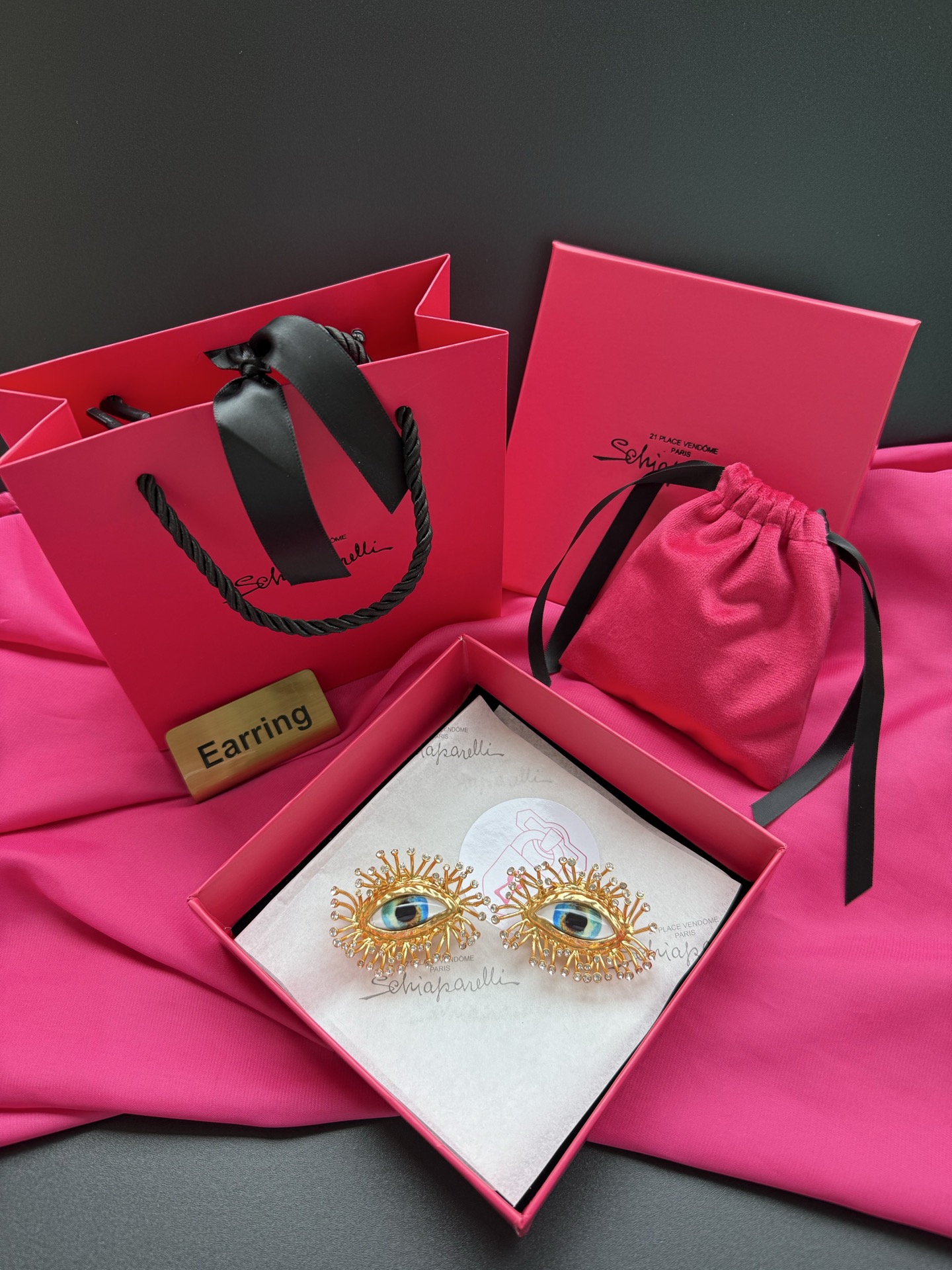 Серьги в виде глаз с золотым ободком Schiaparelli