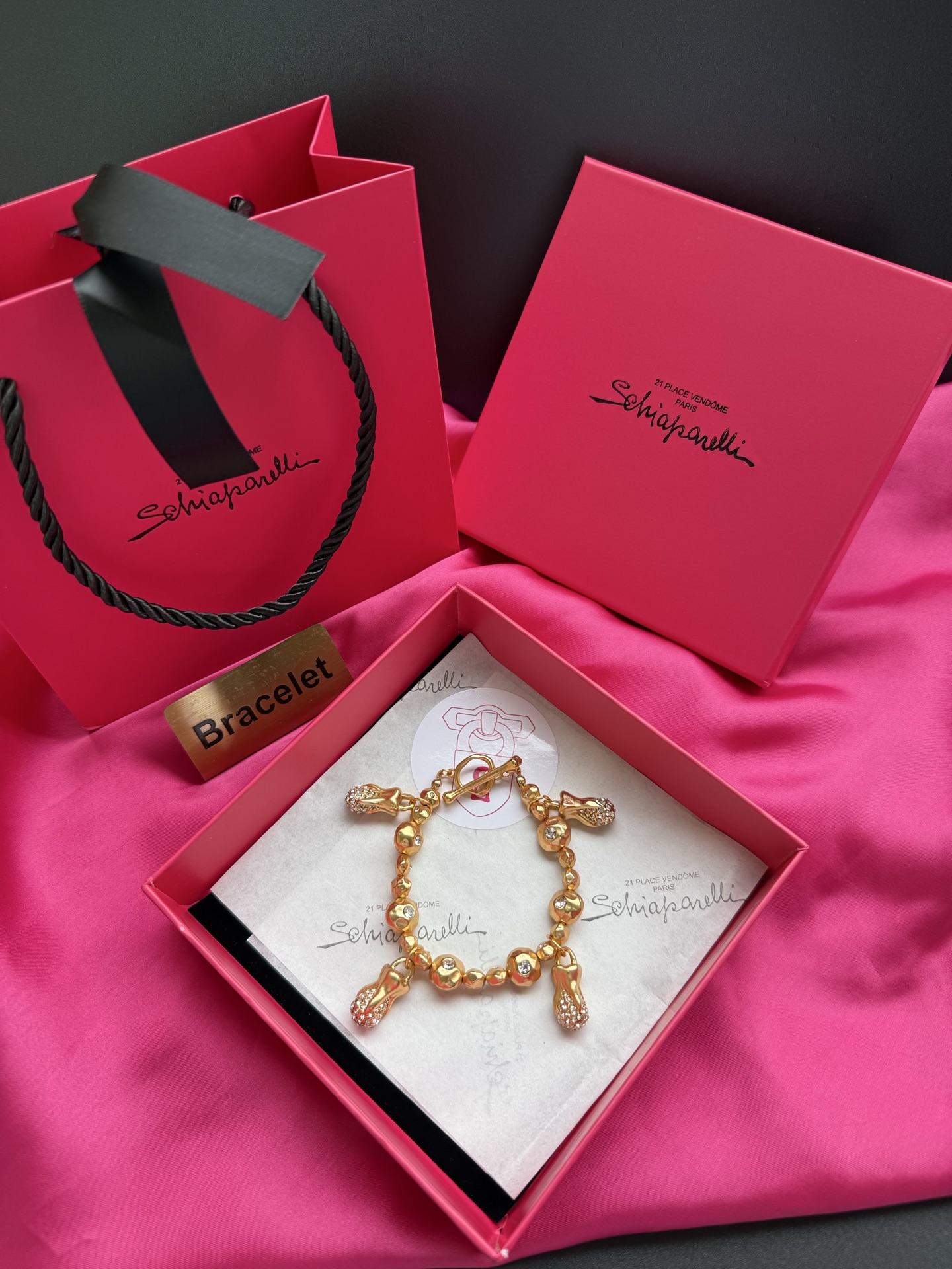 Браслет с подвесками Schiaparelli
