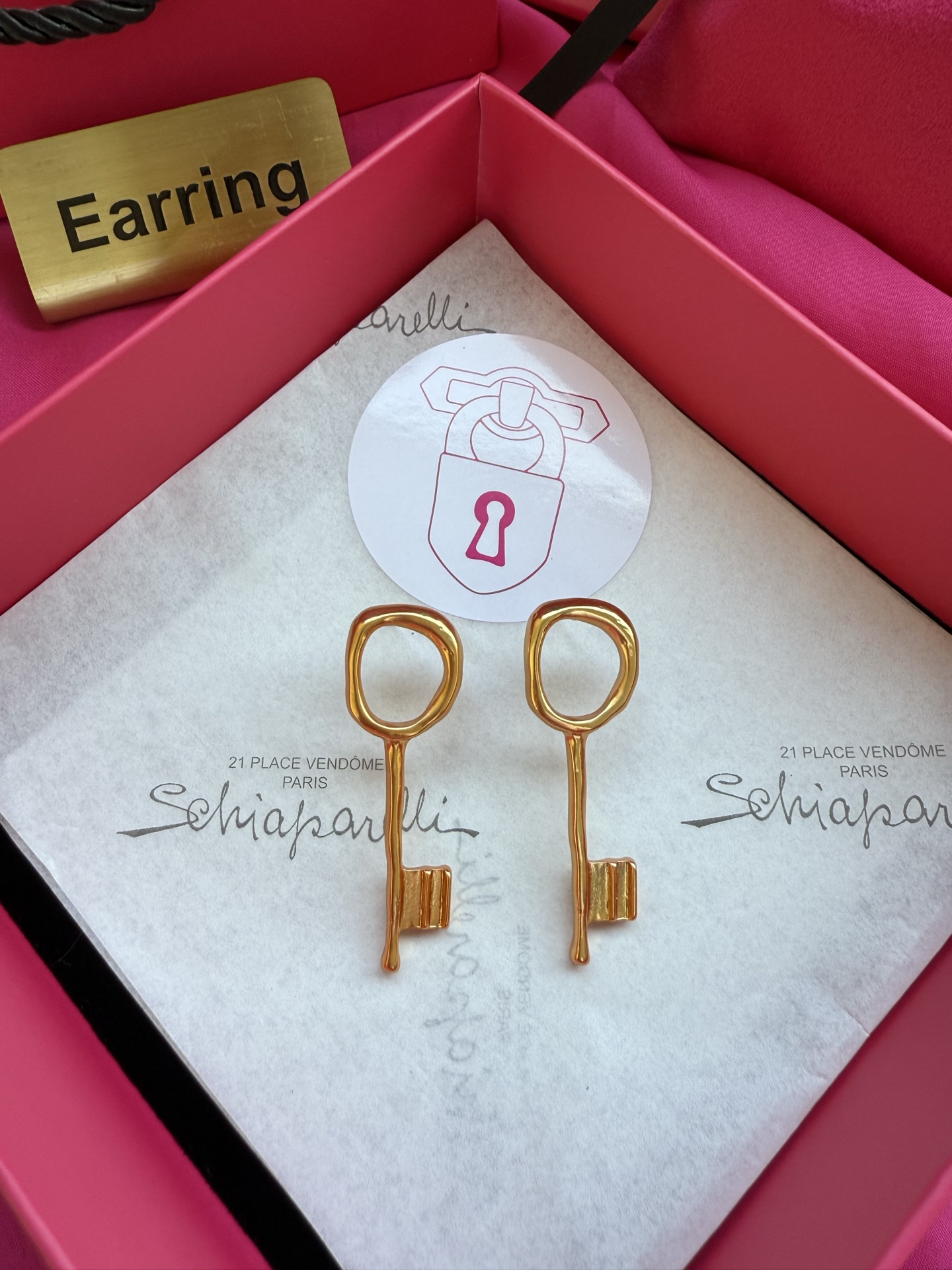 Серьги в форме ключа Schiaparelli