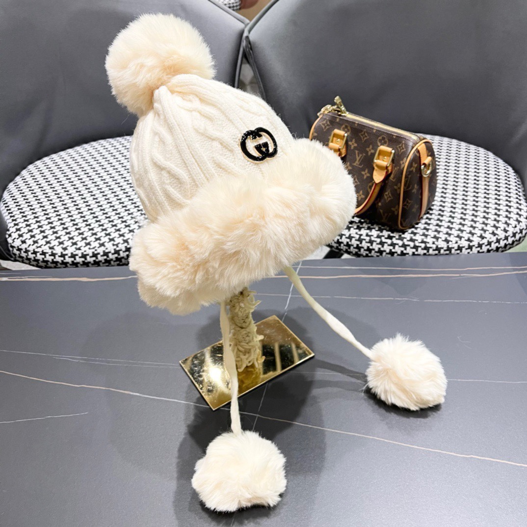 GUCCI古奇 冬季雷锋帽女韩版潮百搭可爱毛球针织毛线帽加绒保暖时尚护耳帽子