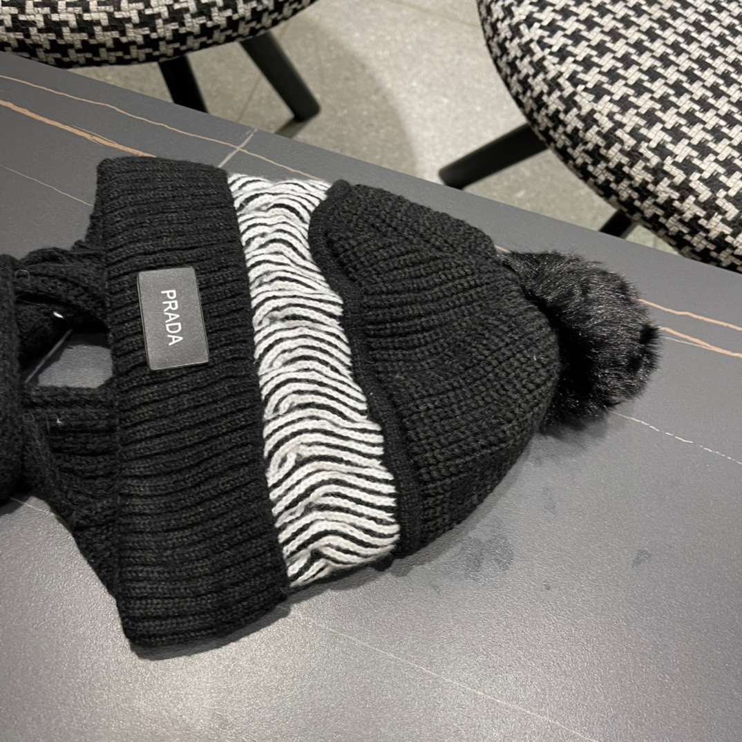 普拉达Prada 2024新款围巾一体毛绒渔夫帽女秋冬帽子冬款针织帽