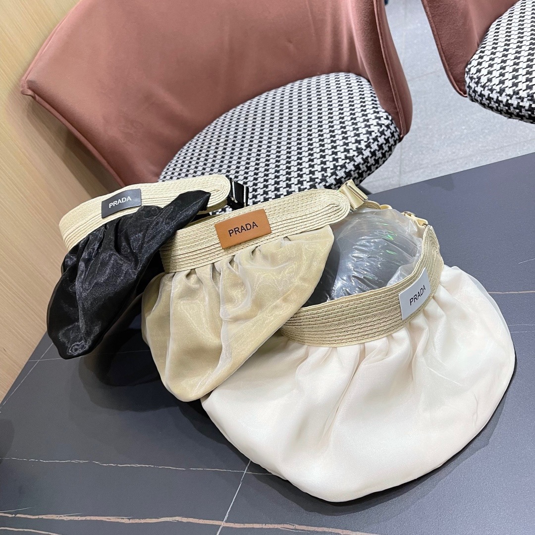 PRADA普拉达夏季新款大檐空顶帽子女出游度假海边可折叠遮阳帽防紫外线太阳帽