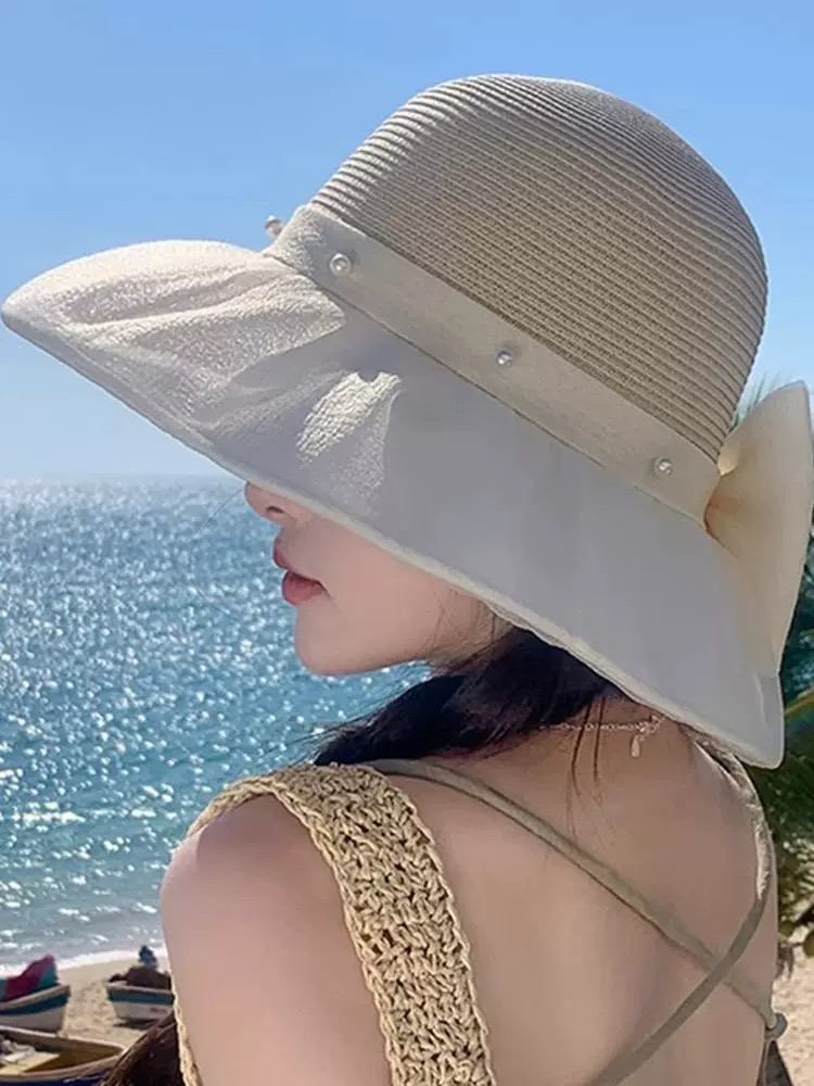 普拉达PRADA 2026早春新款防晒休闲度假遮阳帽子女珍珠蝴蝶结草编渔夫帽显脸小