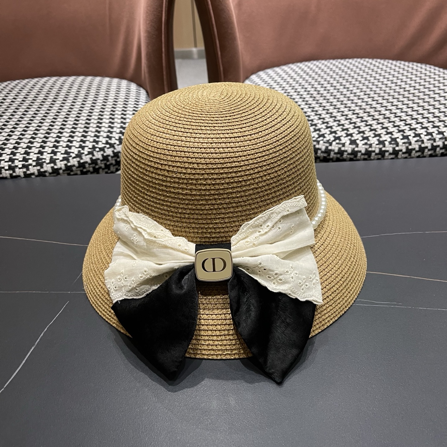 迪奥Dior 法式赫本风大檐渔夫帽子女新款海边度假草帽显脸小蝴蝶结盆帽