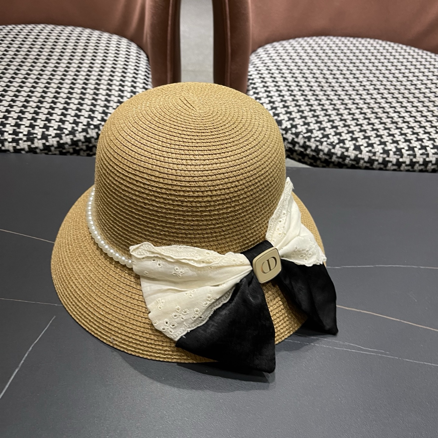 迪奥Dior 法式赫本风大檐渔夫帽子女新款海边度假草帽显脸小蝴蝶结盆帽