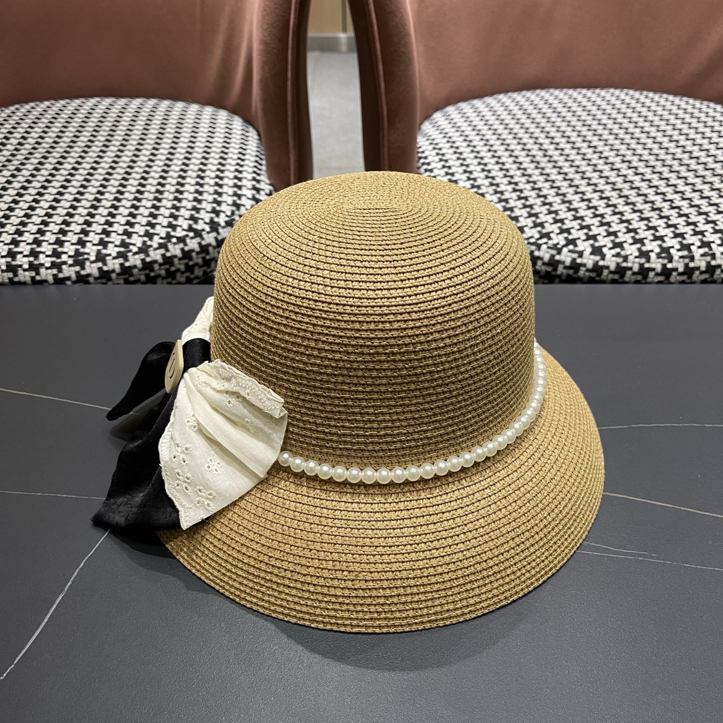 迪奥Dior 法式赫本风大檐渔夫帽子女新款海边度假草帽显脸小蝴蝶结盆帽