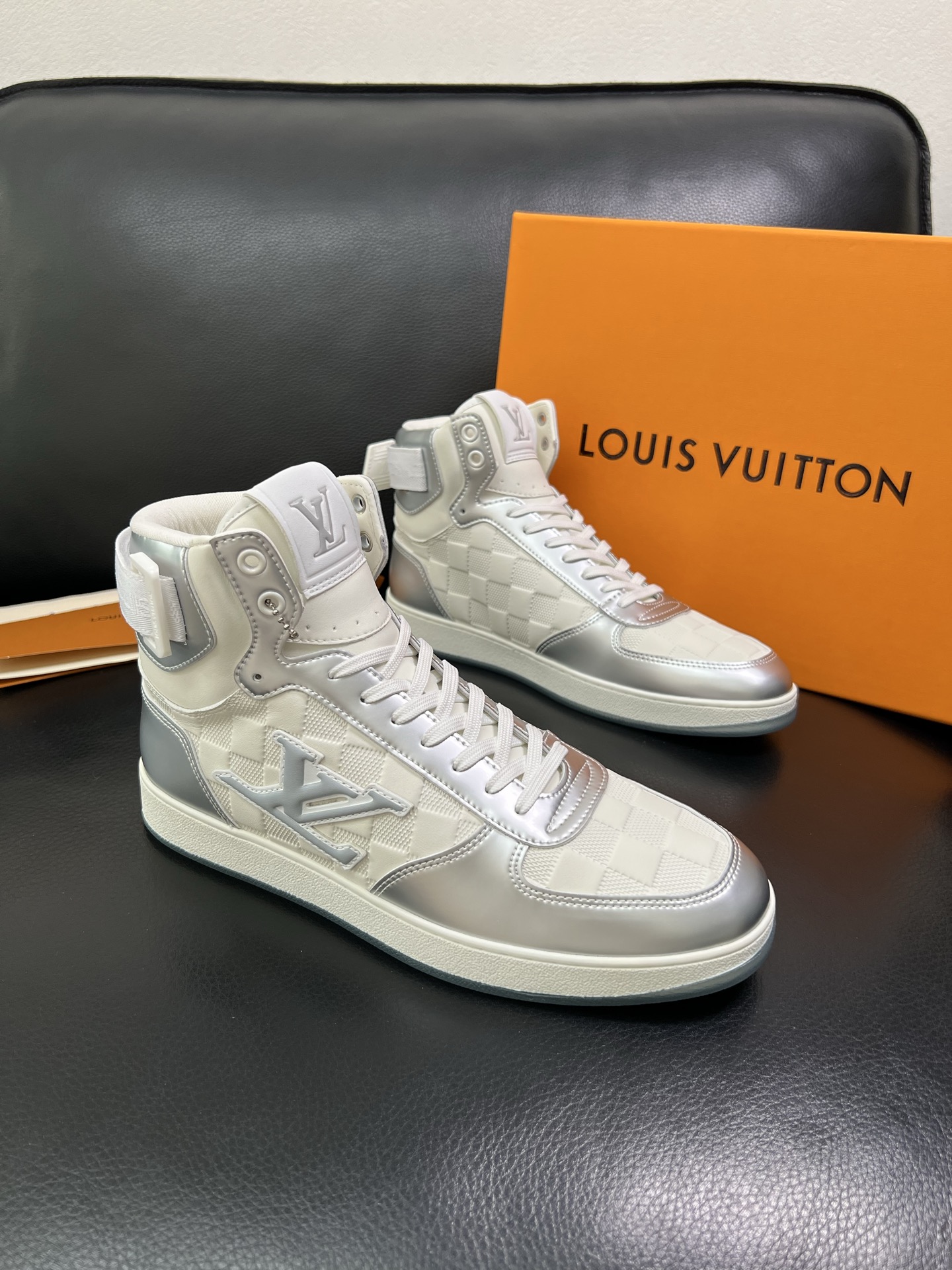 Louis Vuitton High-Top Sneakers in Silver and White Leather 2 i1758536624238 587 0 0