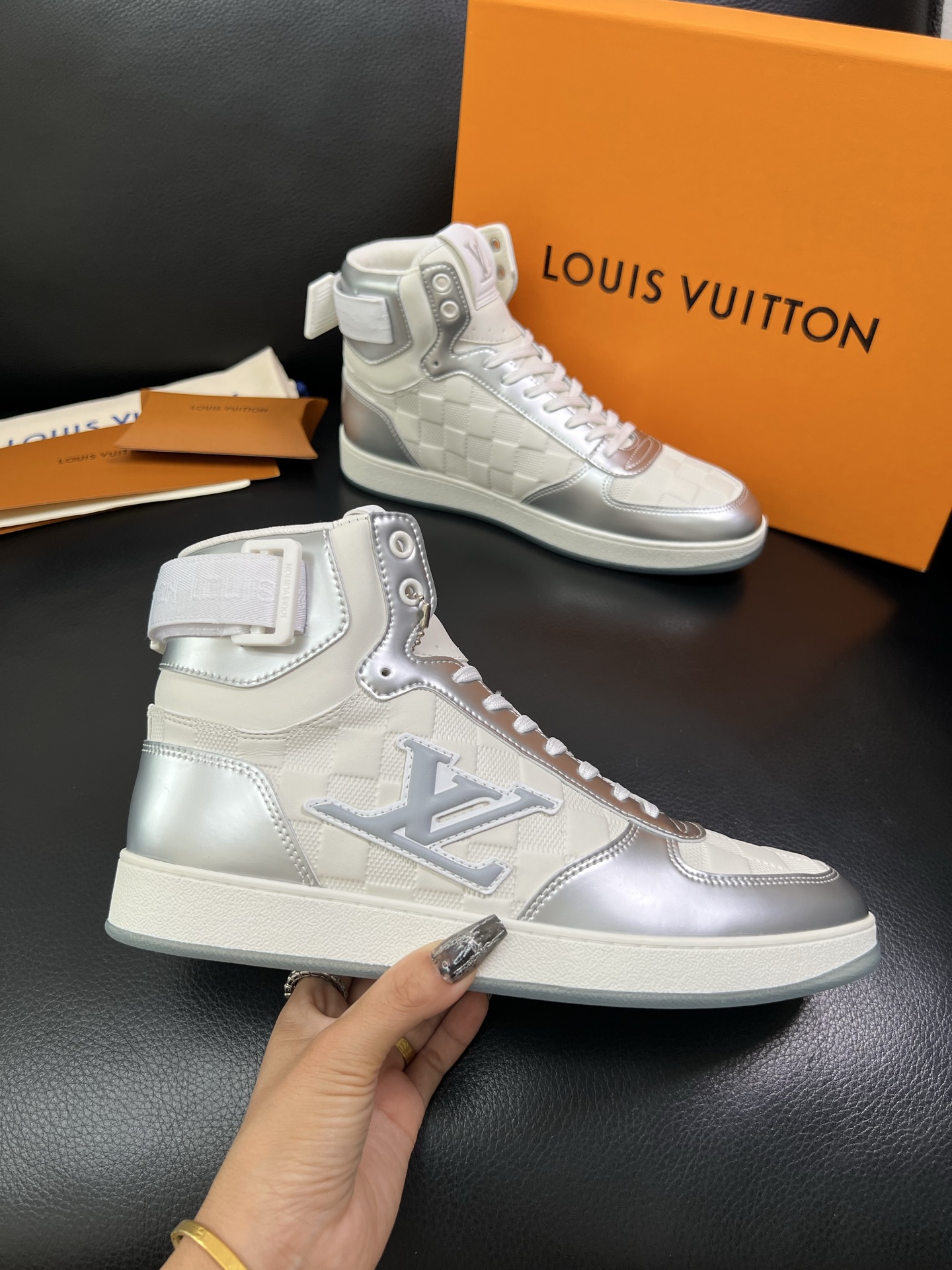 Louis Vuitton High-Top Sneakers in Silver and White Leather 4 i1758536624470 3199 0 2