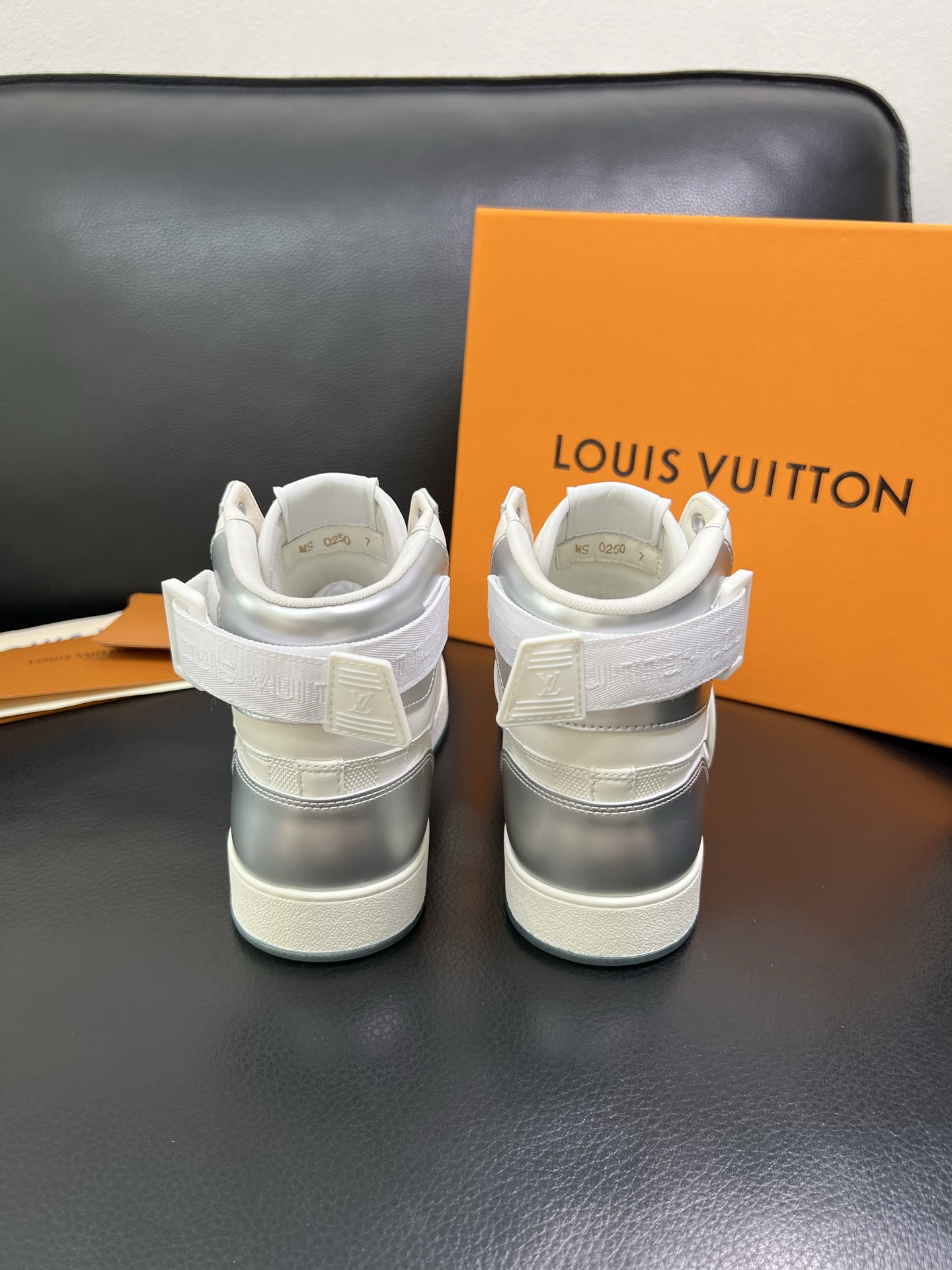 Louis Vuitton High-Top Sneakers in Silver and White Leather 9 i1758536625921 9774 0 7