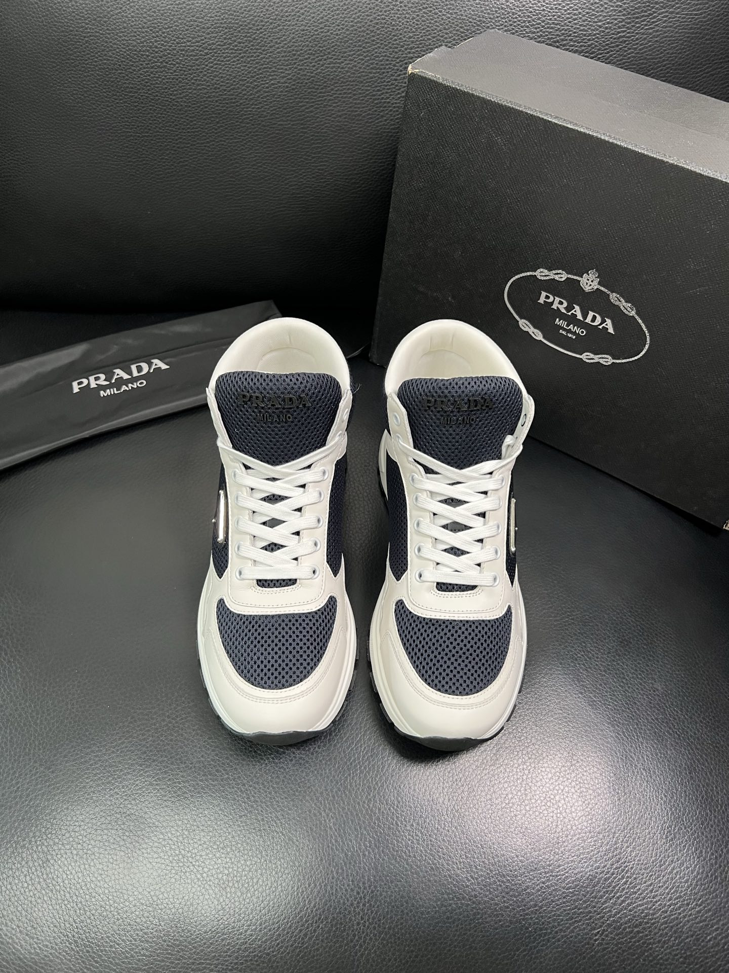 Prada High-Top Sneakers in Leather and Mesh - Classic Style, Ultimate Comfort 4 i1758537513373 3414 0 2