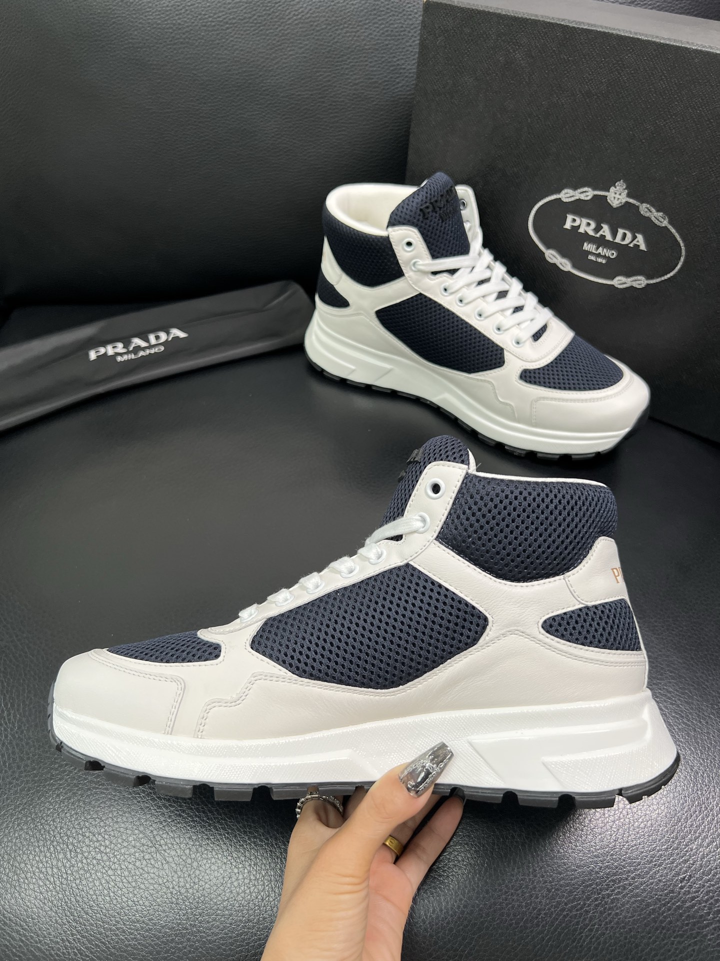 Prada High-Top Sneakers in Leather and Mesh - Classic Style, Ultimate Comfort 6 i1758537513391 1165 0 4