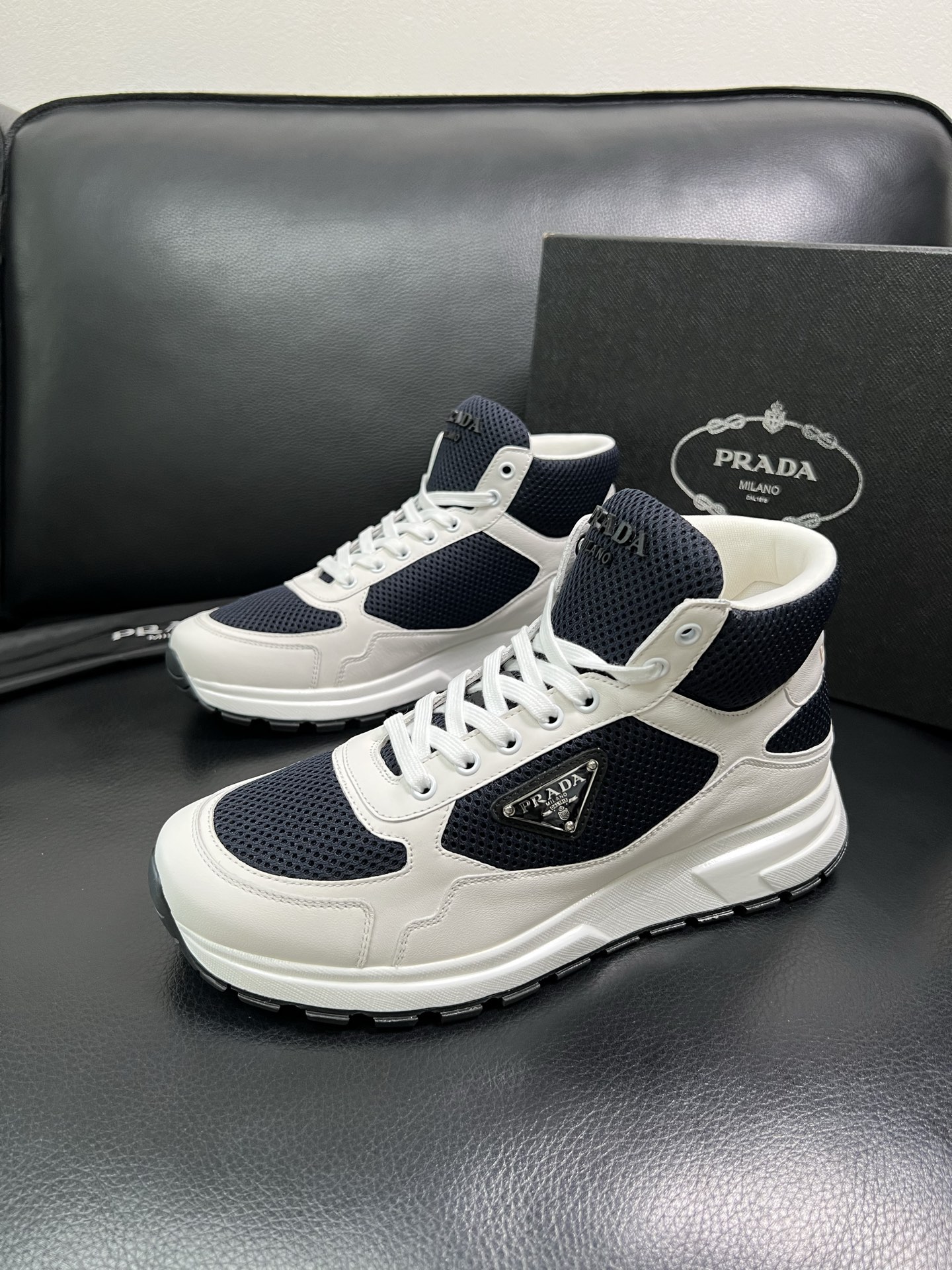 Prada High-Top Sneakers in Leather and Mesh - Classic Style, Ultimate Comfort 3 i1758537514775 7491 0 1