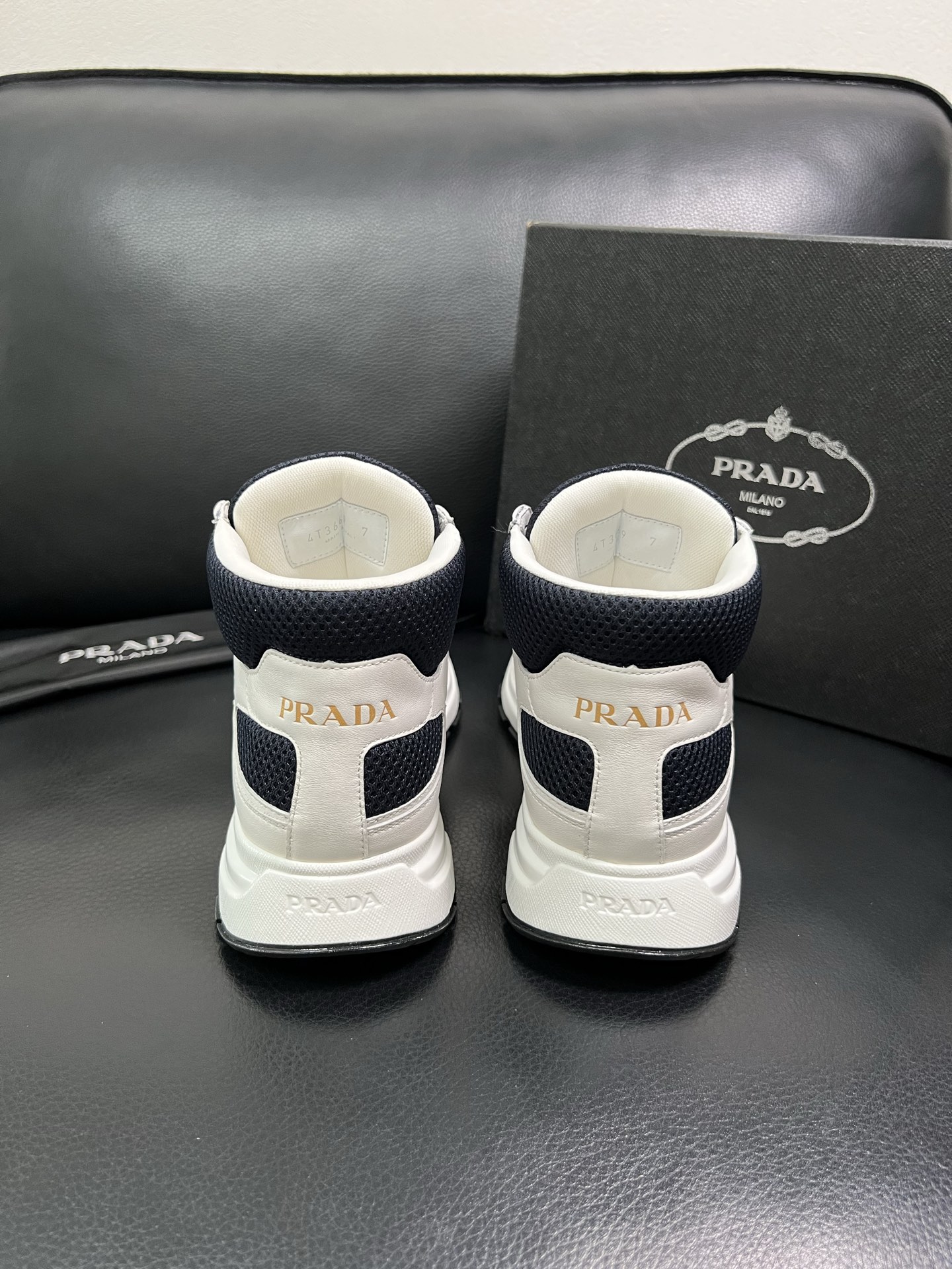 Prada High-Top Sneakers in Leather and Mesh - Classic Style, Ultimate Comfort 9 i1758537514776 9590 0 7