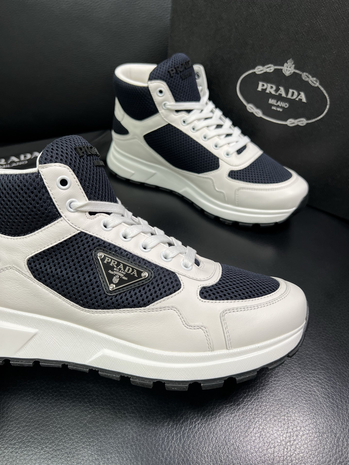 Prada High-Top Sneakers in Leather and Mesh - Classic Style, Ultimate Comfort 7 i1758537514790 8503 0 5
