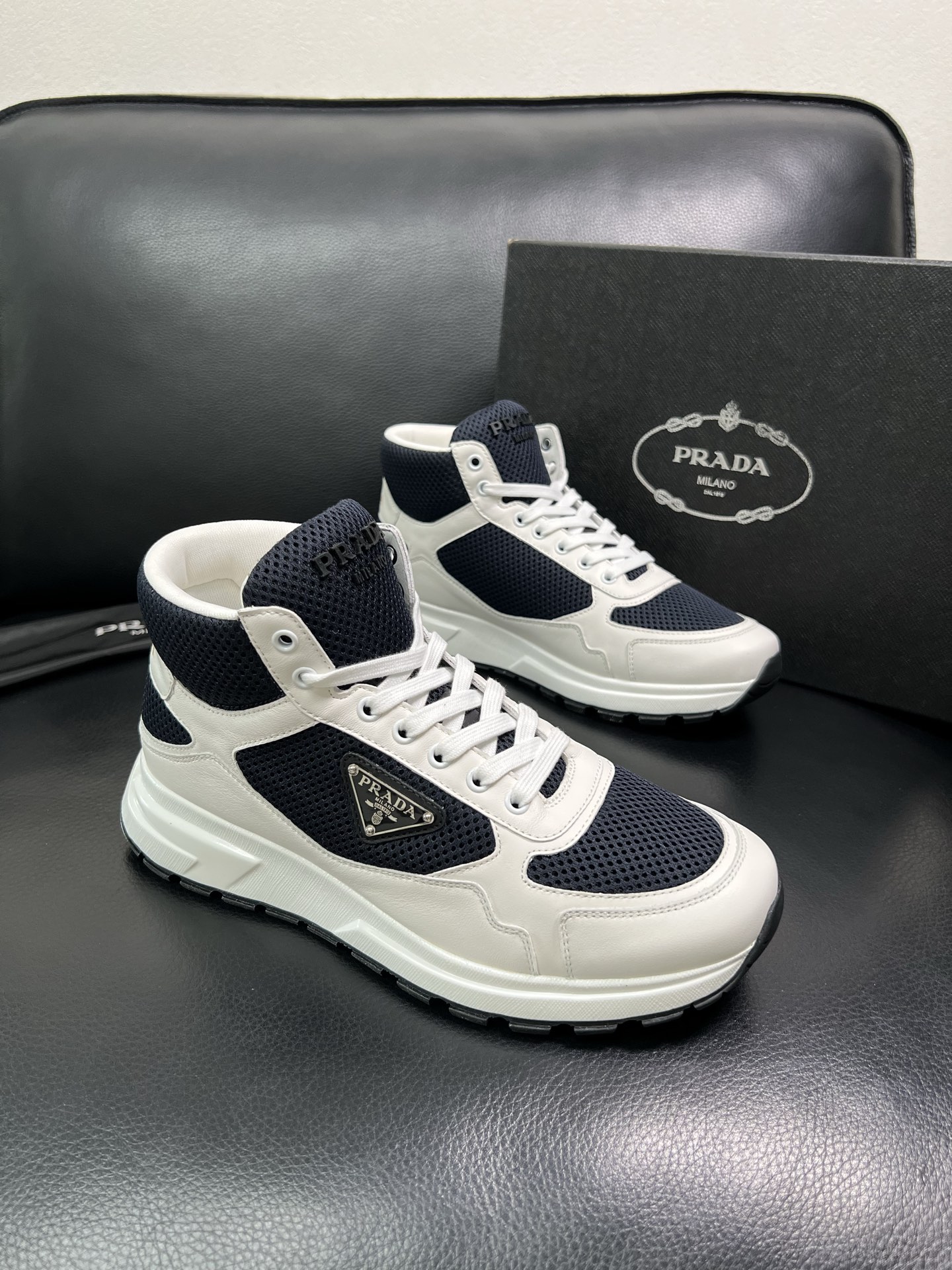 Prada High-Top Sneakers in Leather and Mesh - Classic Style, Ultimate Comfort 2 i1758537514801 7053 0 0
