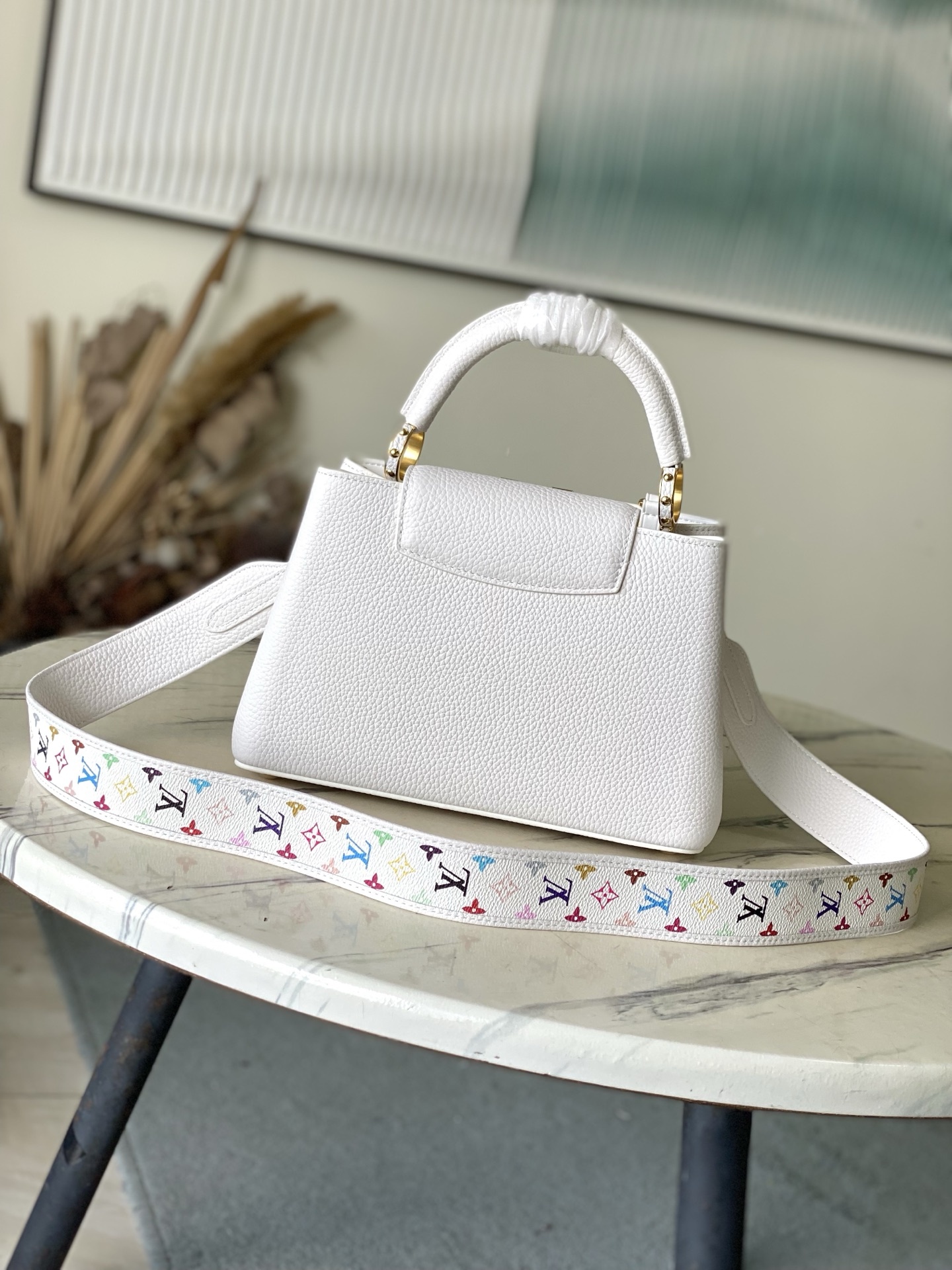 特级原厂皮 M13253小号 本款Capucines手袋出自路易威登x村上隆再版系列,选用Taurill