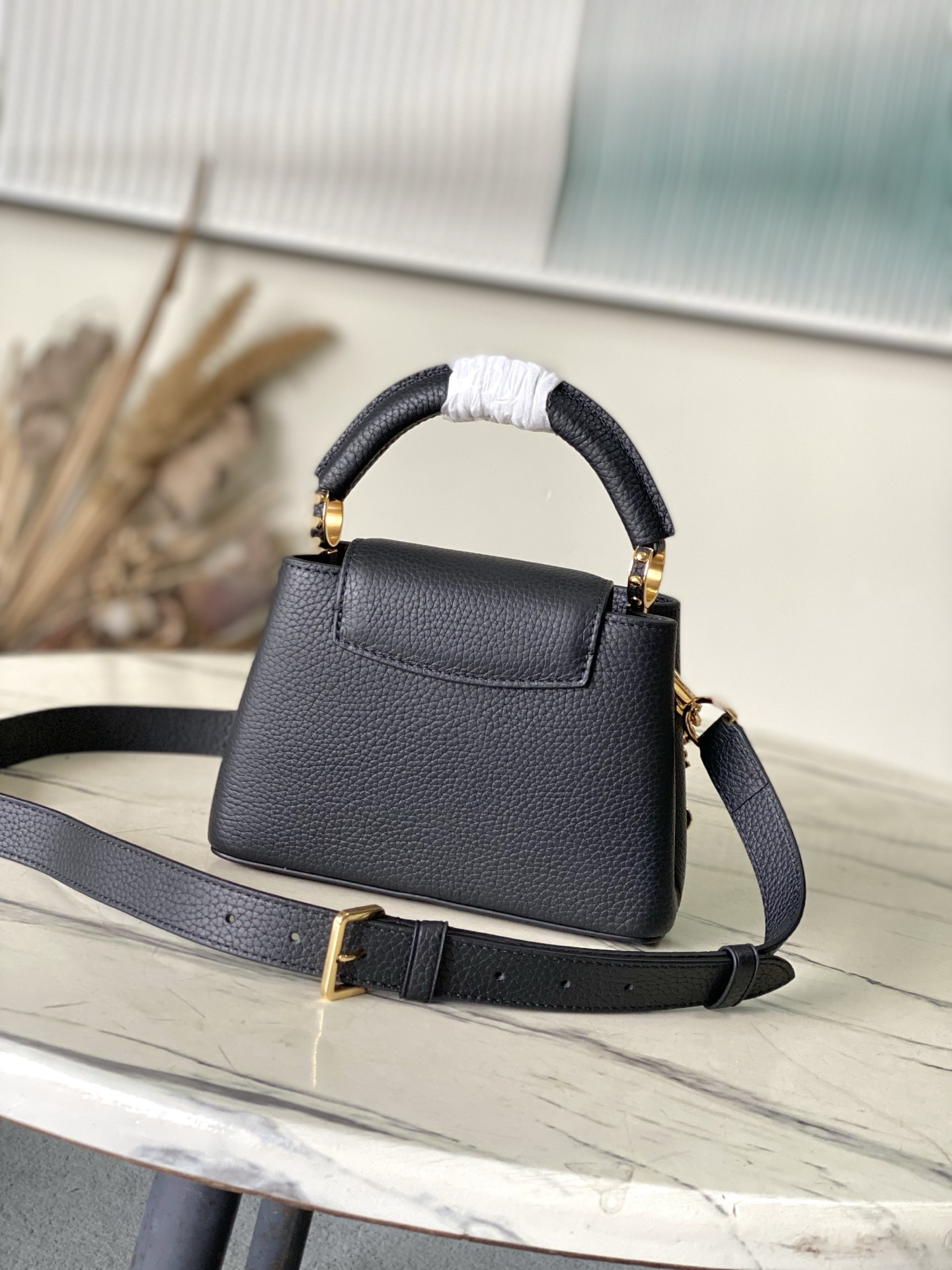 特级原厂皮 M13714 迷你 本款Capucines 迷你 手袋出自路易威登x村上隆复刻系列,以灵动风