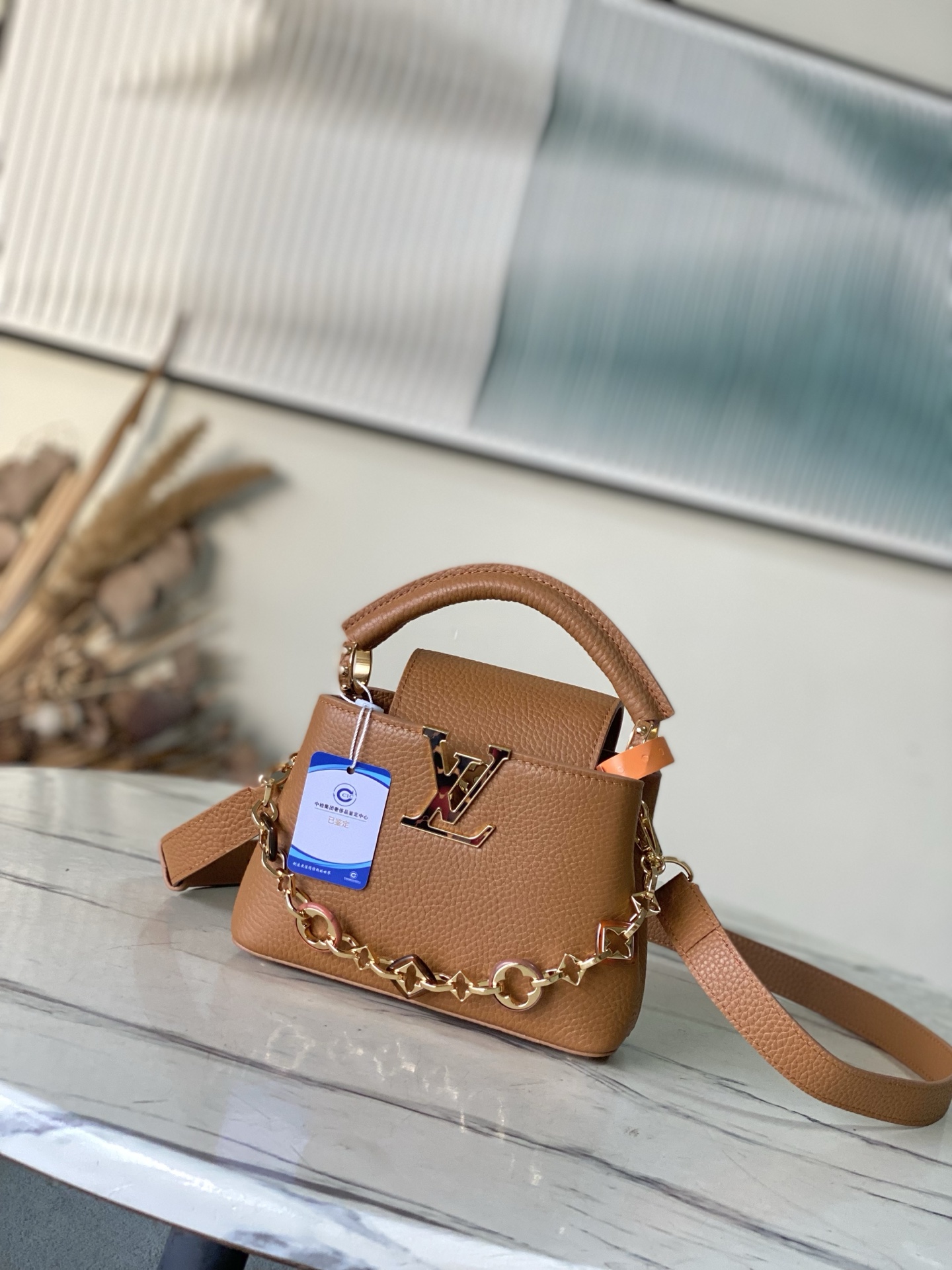 特级原厂皮 M14381 迷你 本款Capucines迷你 手袋出自Harmony系列，以装饰性链条探索