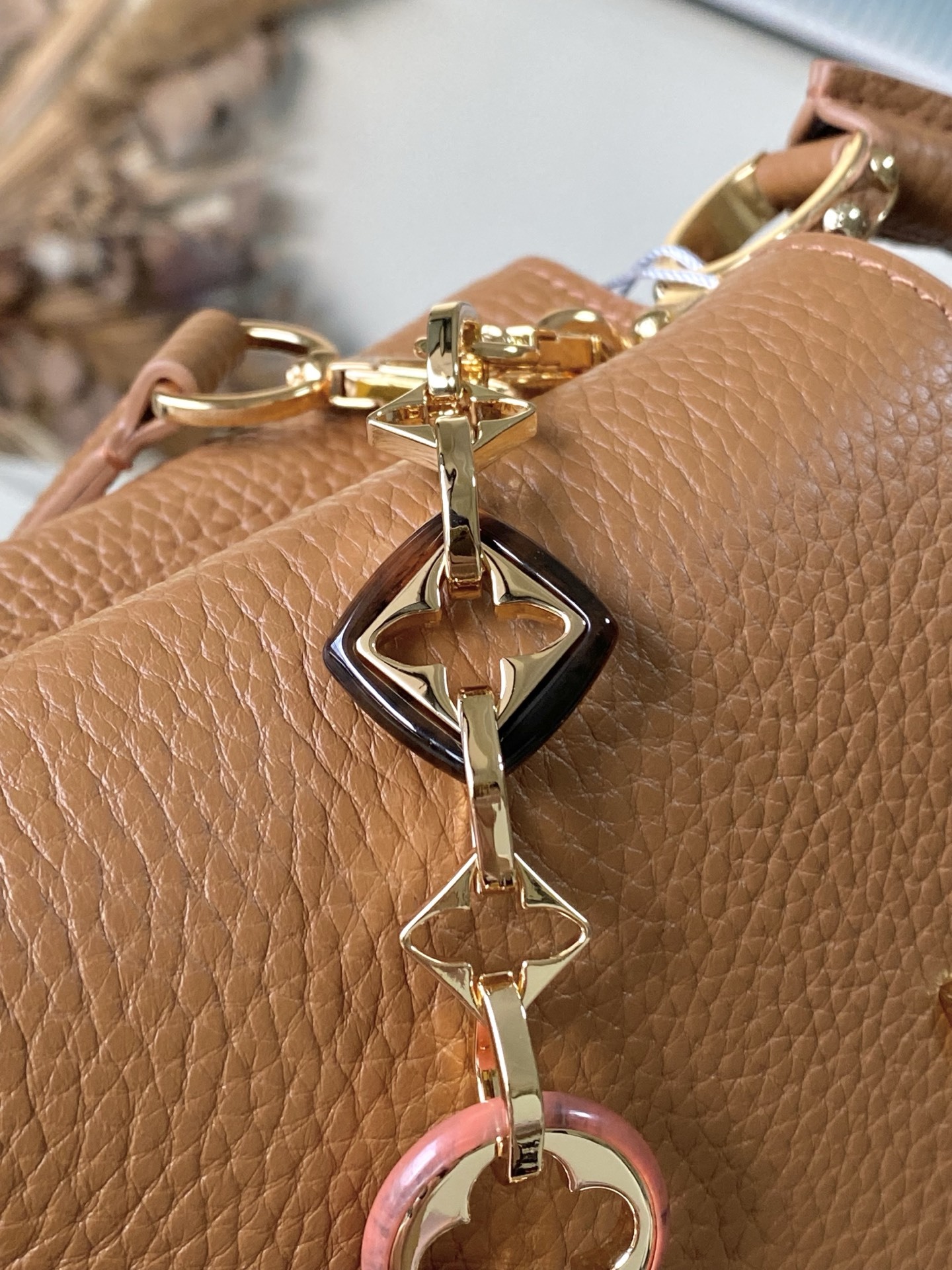 特级原厂皮 M14381 迷你 本款Capucines迷你 手袋出自Harmony系列,以装饰性链条探索