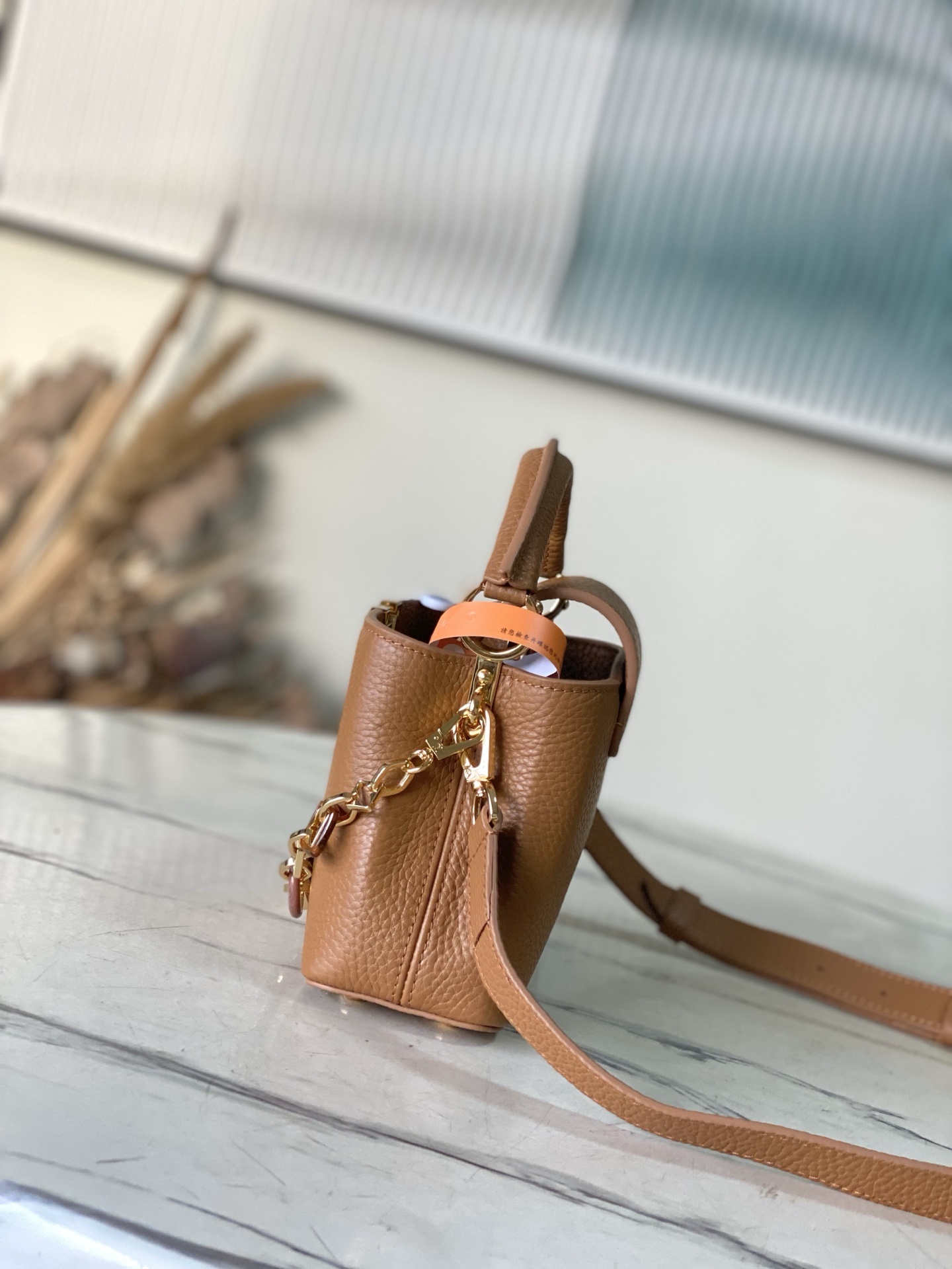 特级原厂皮 M14381 迷你 本款Capucines迷你 手袋出自Harmony系列,以装饰性链条探索