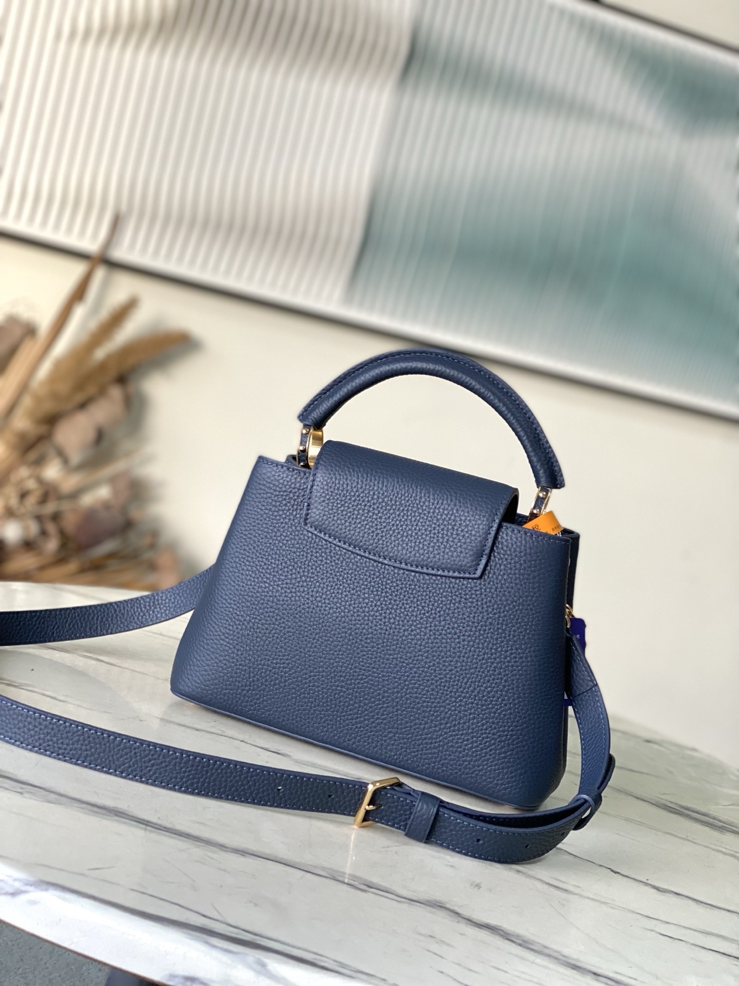 特级原厂皮 M14971 小号 本款Capucines小号手袋出自Harmony系列,以装饰性链条探索M