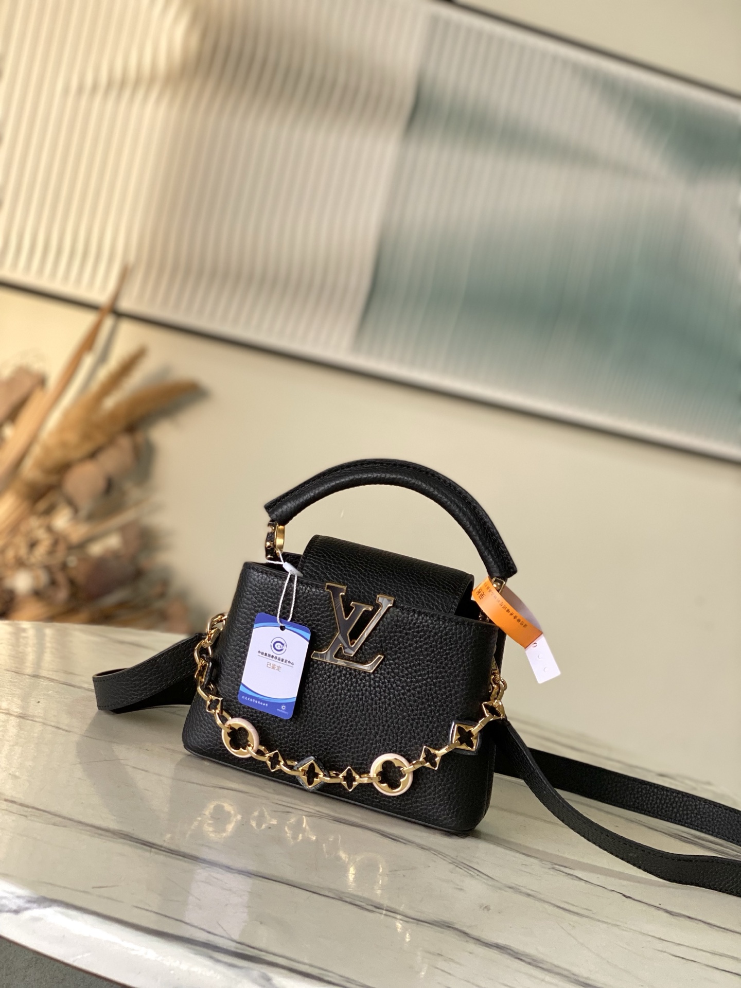 特级原厂皮 M14970 迷你 本款Capucines迷你 手袋出自Harmony系列，以装饰性链条探索