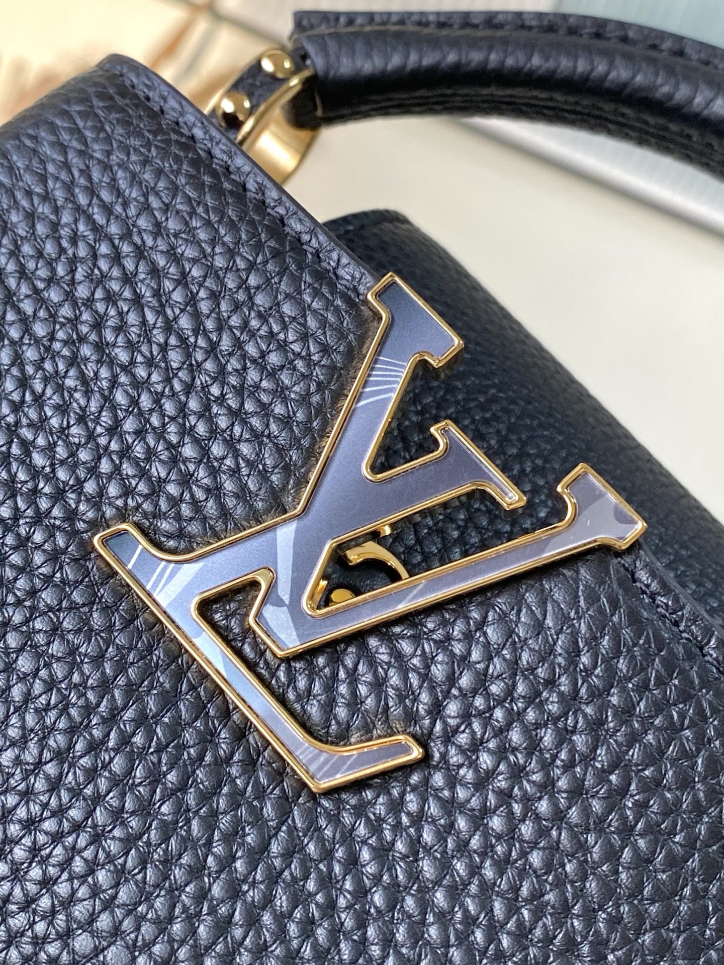 特级原厂皮 M14970 迷你 本款Capucines迷你 手袋出自Harmony系列,以装饰性链条探索