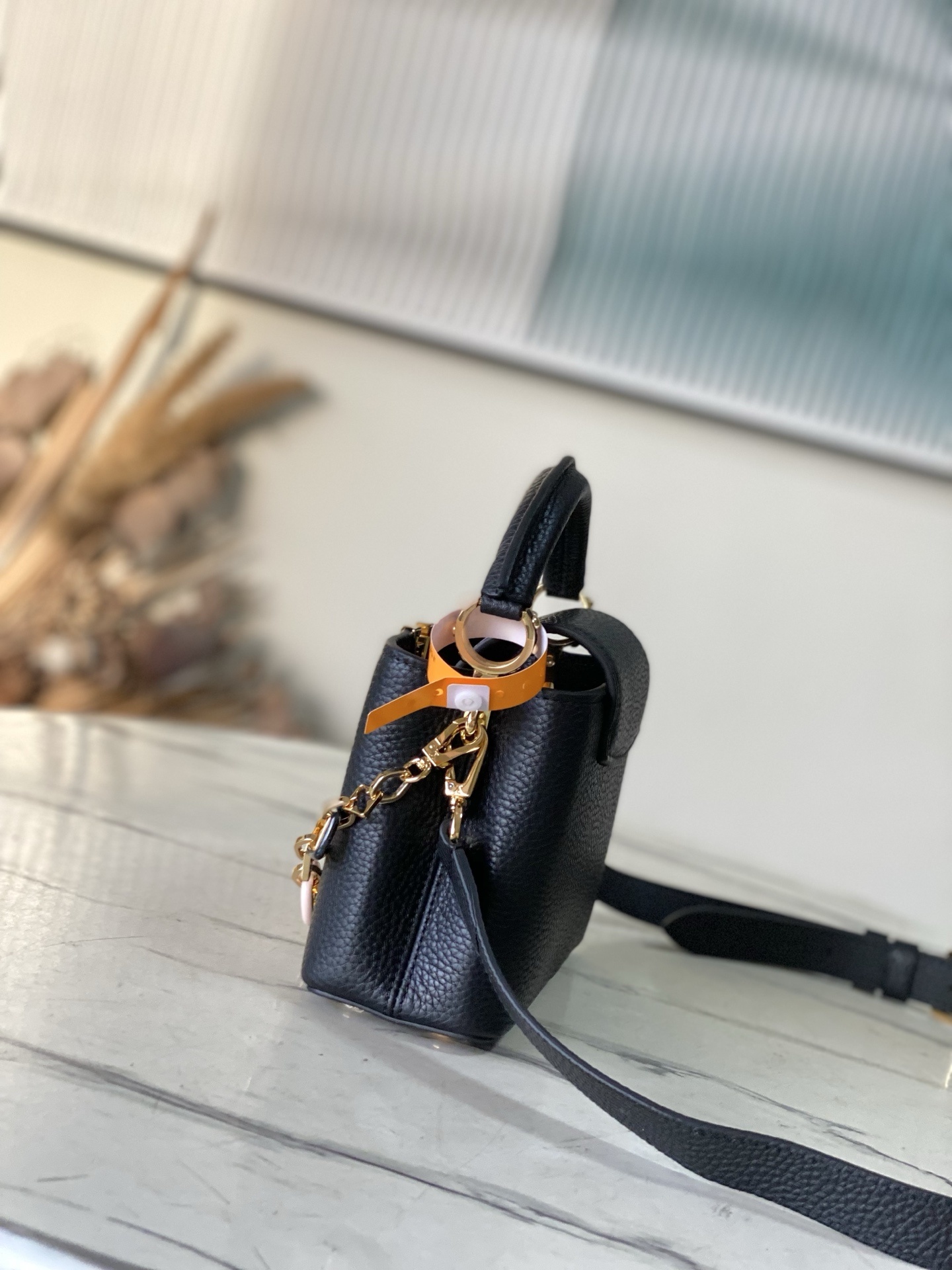 特级原厂皮 M14970 迷你 本款Capucines迷你 手袋出自Harmony系列,以装饰性链条探索