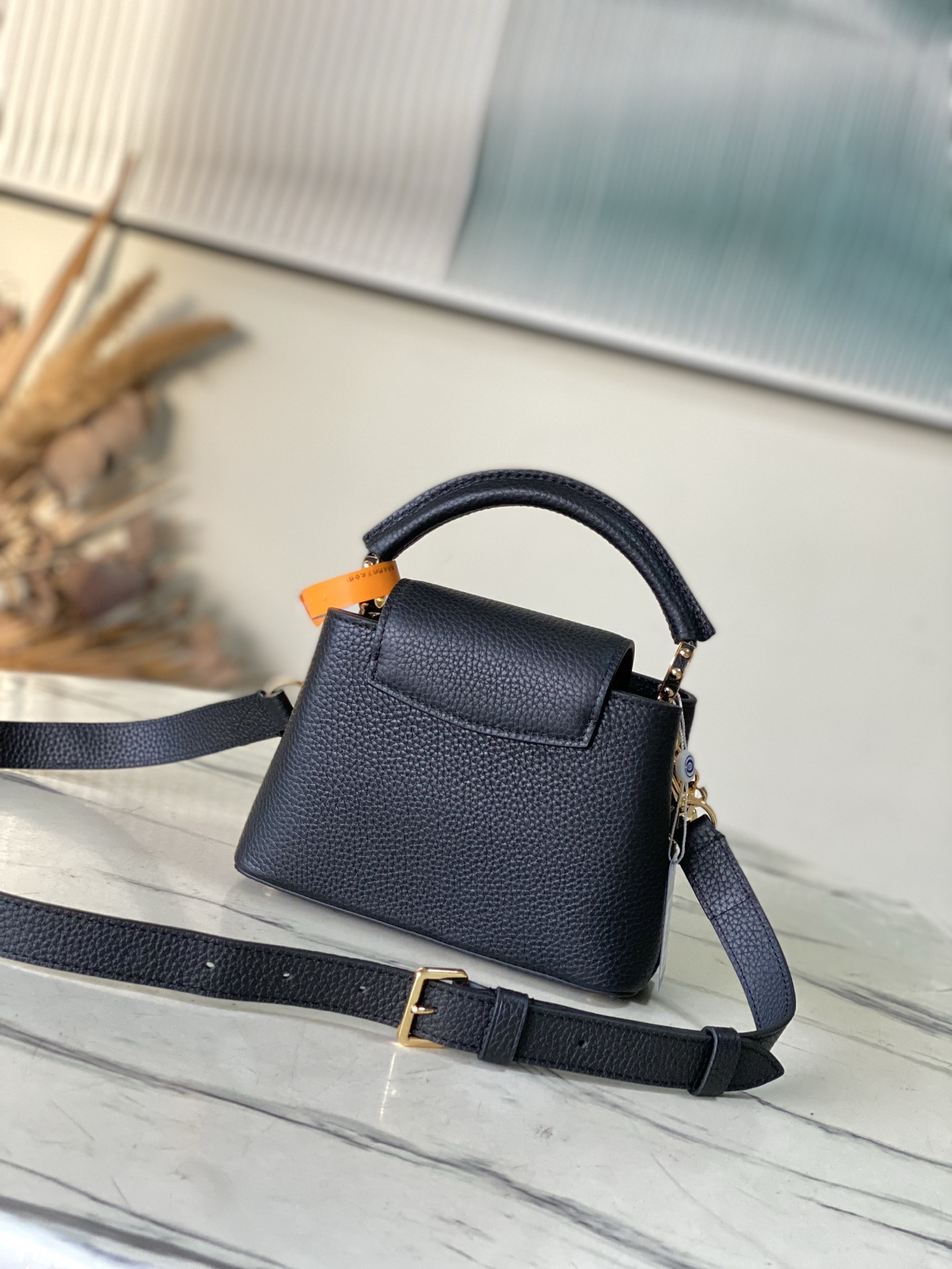 特级原厂皮 M14970 迷你 本款Capucines迷你 手袋出自Harmony系列,以装饰性链条探索