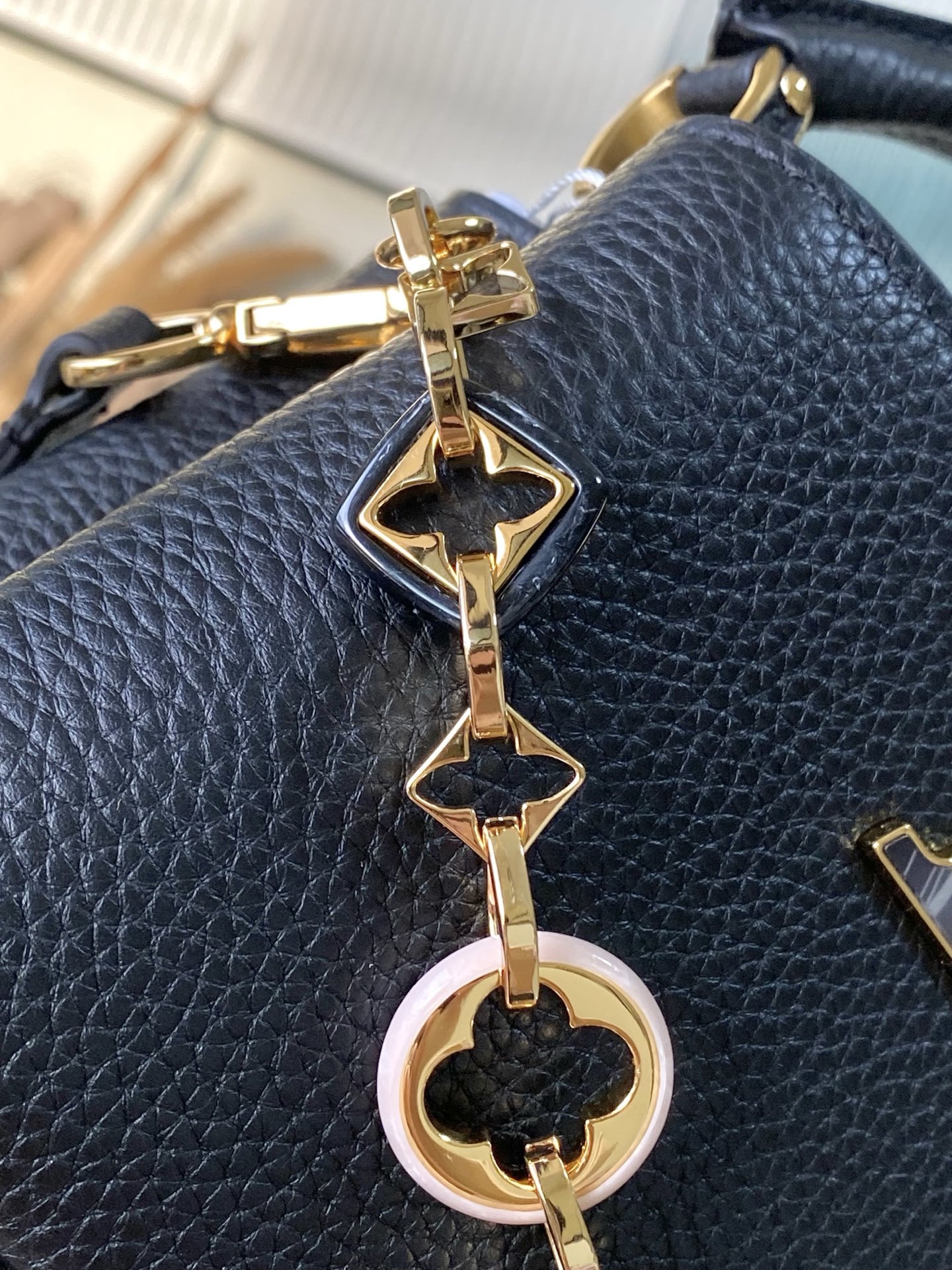 特级原厂皮 M14970 迷你 本款Capucines迷你 手袋出自Harmony系列,以装饰性链条探索