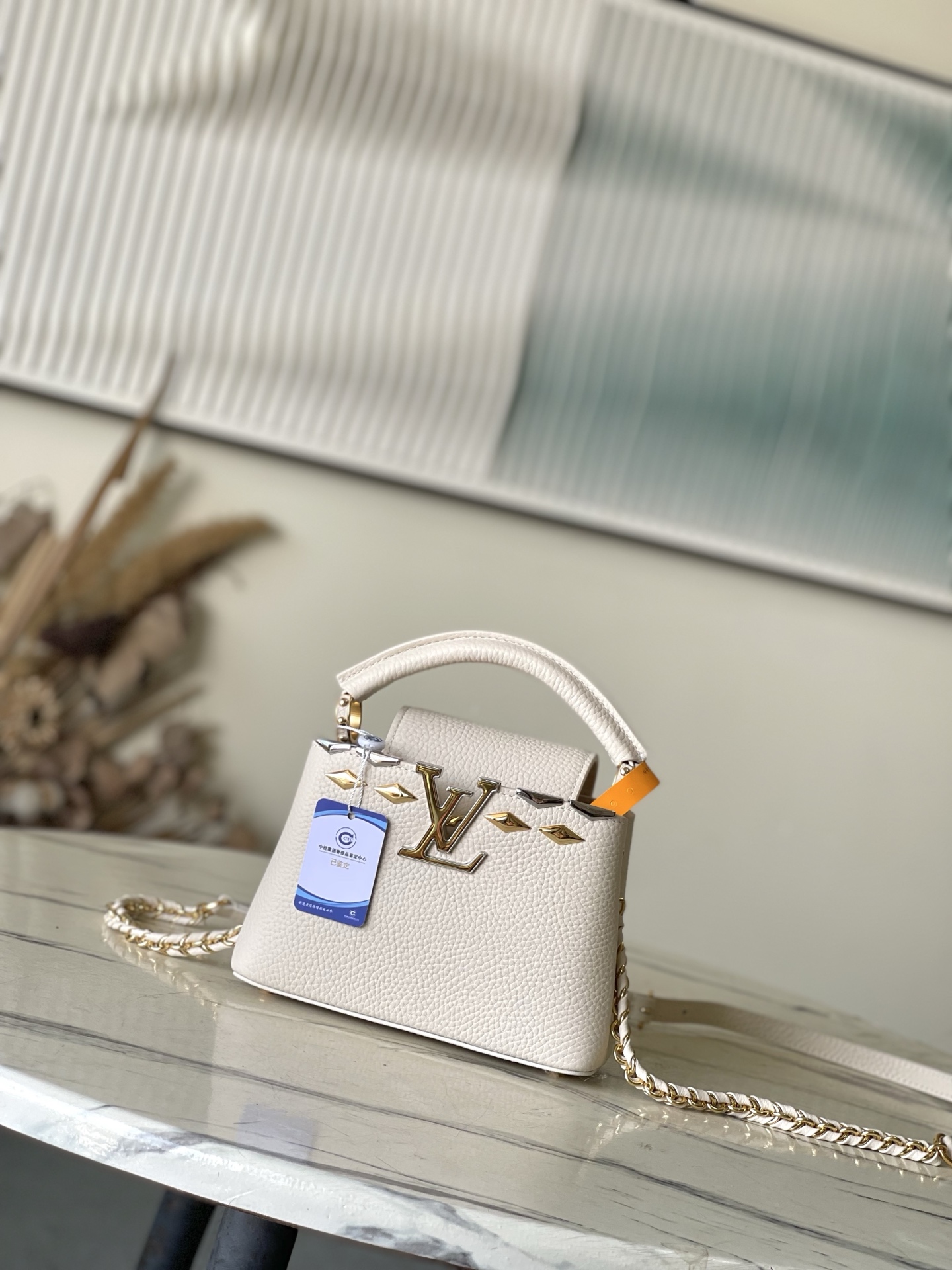 特级原厂皮 M11964 米白迷你 本款Capucines 迷你手袋材Taurillon牛皮革，以混合金