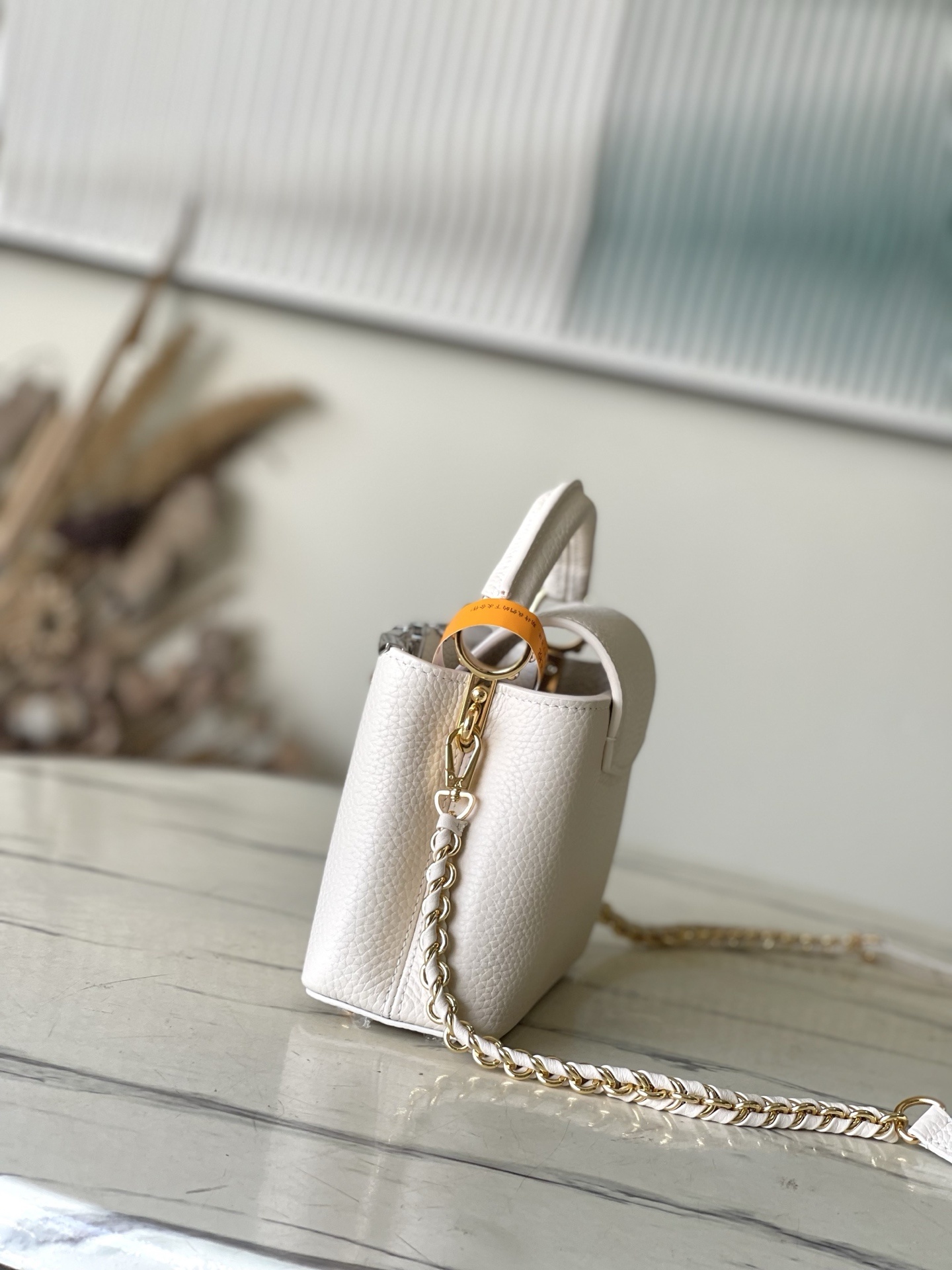 特级原厂皮 M11964 米白迷你 本款Capucines 迷你手袋材Taurillon牛皮革,以混合金