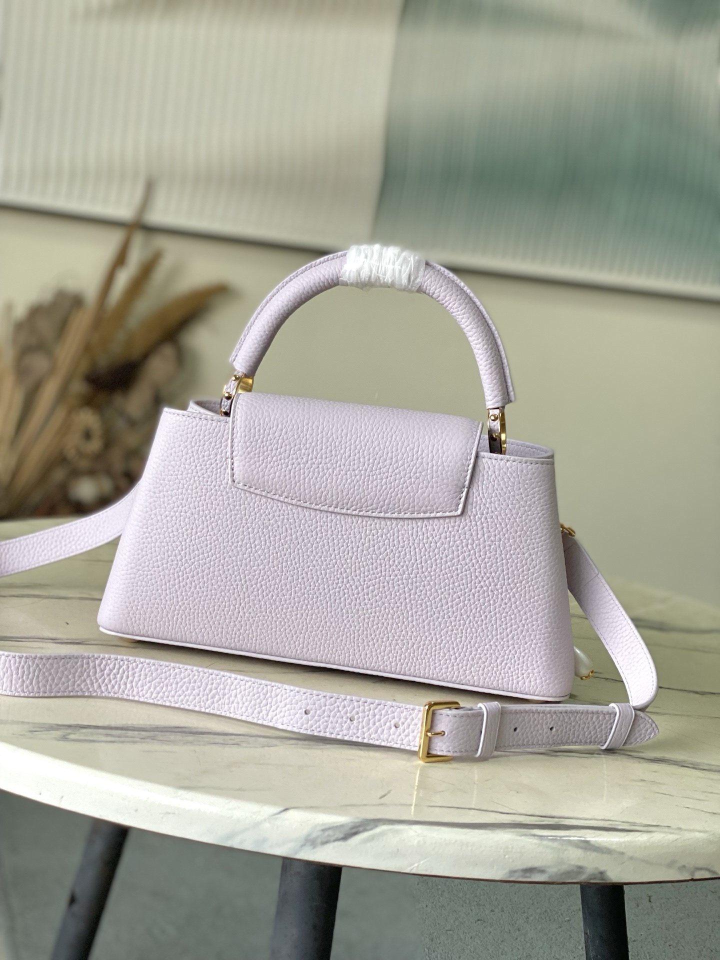 特级原厂皮 M25476 紫色小号 本款Capucines小号手袋向巴洛克风格珠宝汲取灵感,为链条融入贝