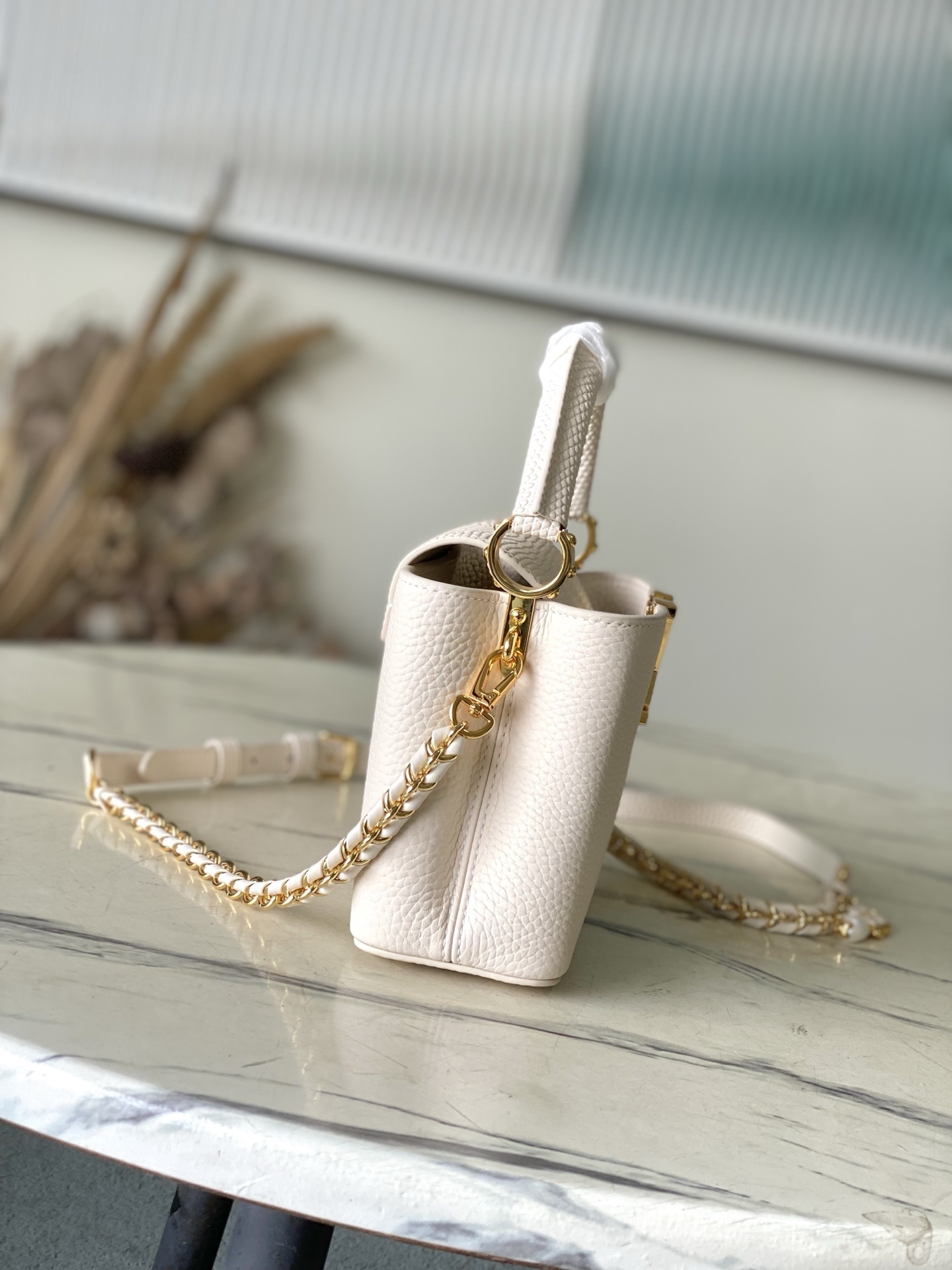 特级原厂皮 M25611 迷你 本款Nano手袋出自Capucines Daydream系列,为Taur