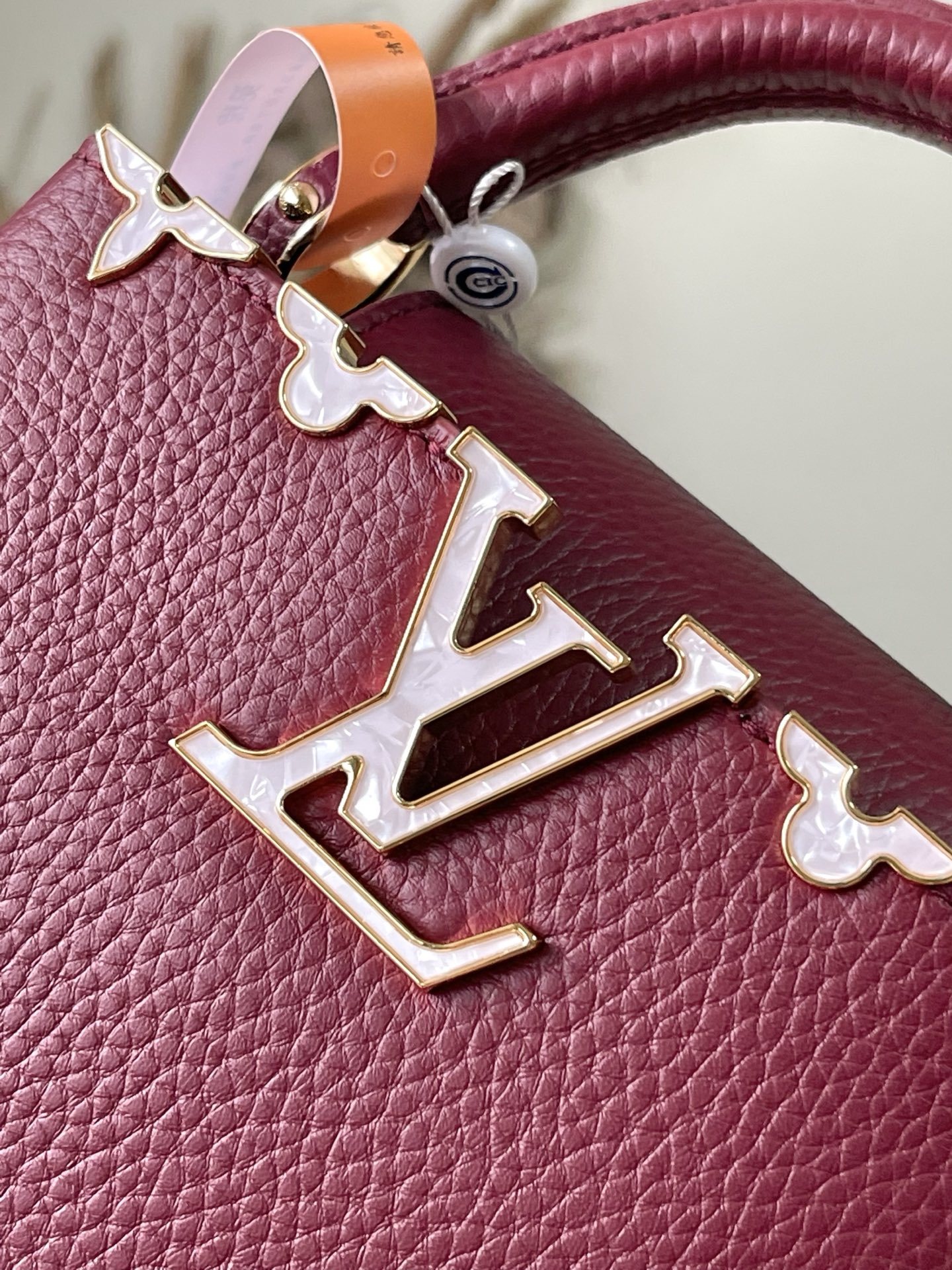 特级原厂皮 M11341 枣红金 本款Capucines mini手袋取材经典Taurillon 牛皮革