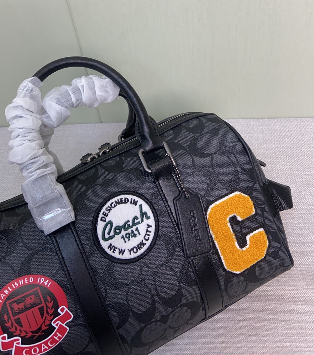 Coach Coa*h Venturer枕头包波士顿 27 来啦 CY821 的包型搭配徽章设计