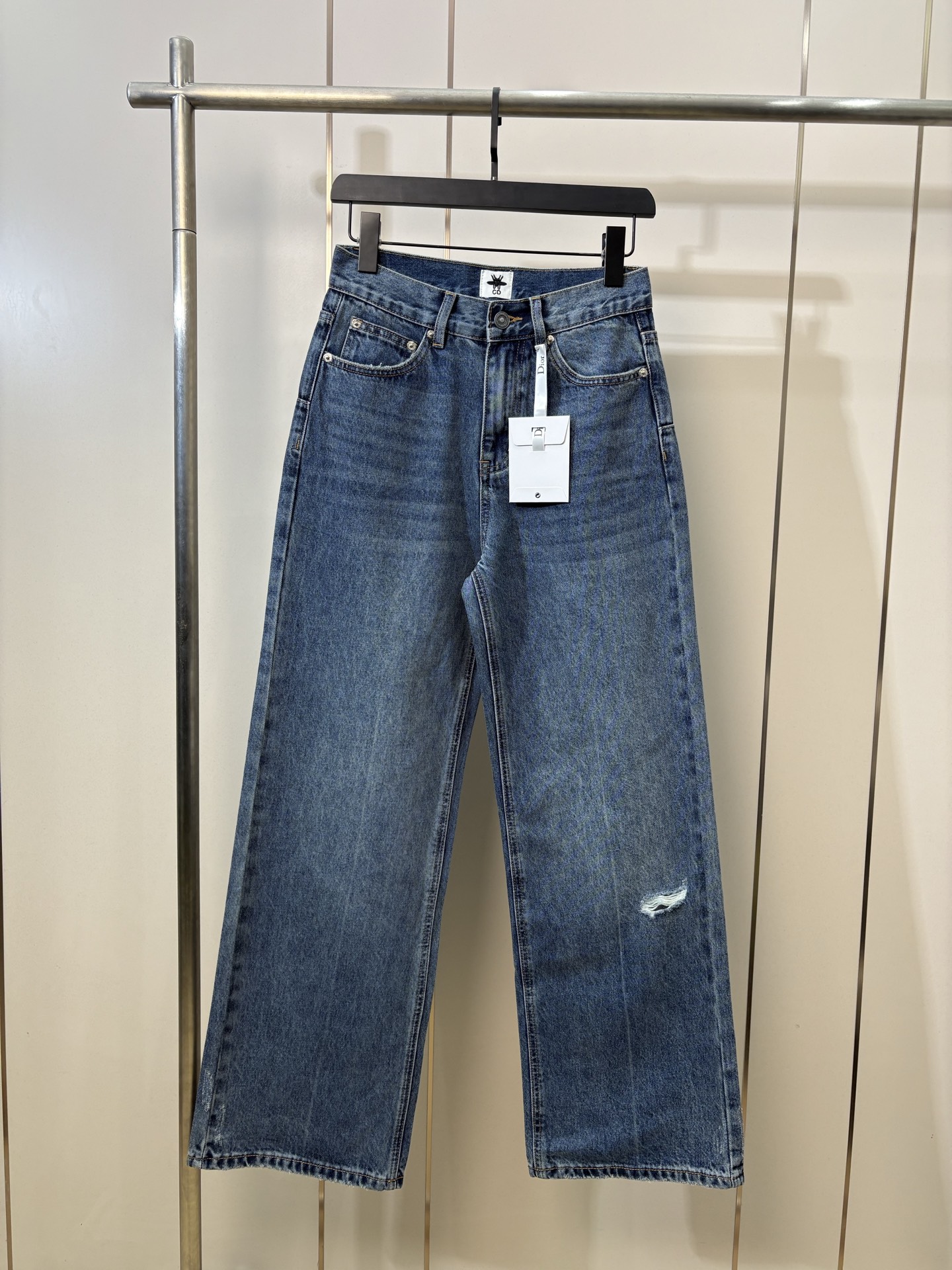 Dior Women's Blue Ripped High-Waisted Wide Leg Jeans - Spring/Summer Collection