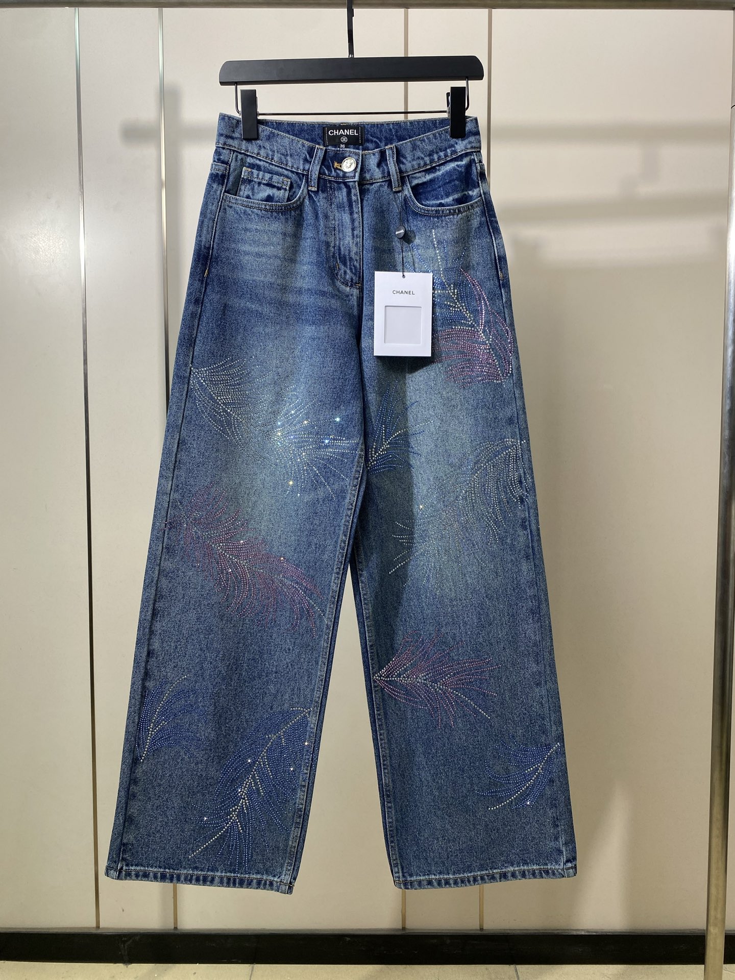 Chanel High-Waisted Wide-Leg Jeans with Feather Rhinestone Embellishments