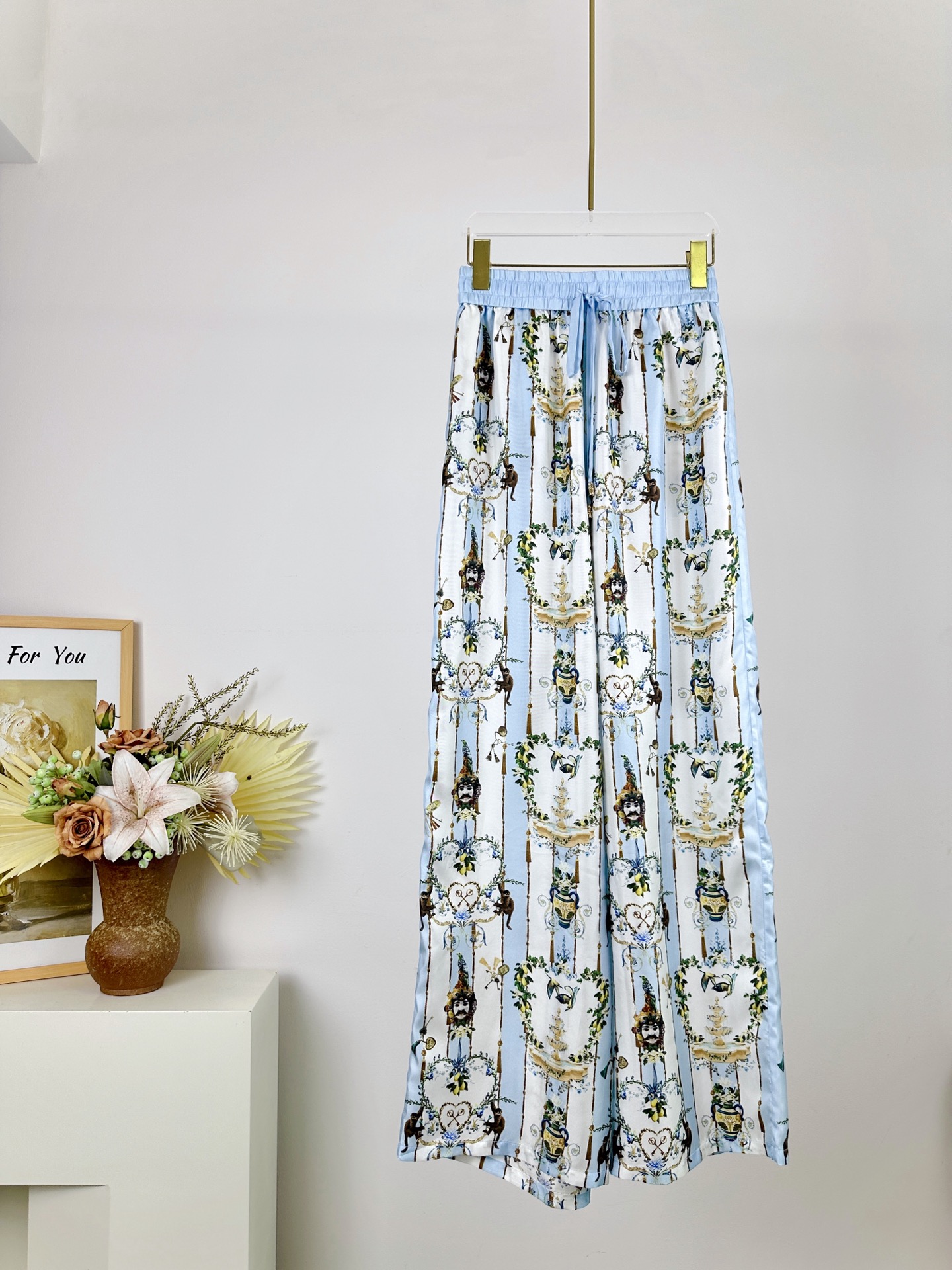 “Hard-Core Woman: Camilla Silk Pants with Unique Details and Crystal Hot Tips”