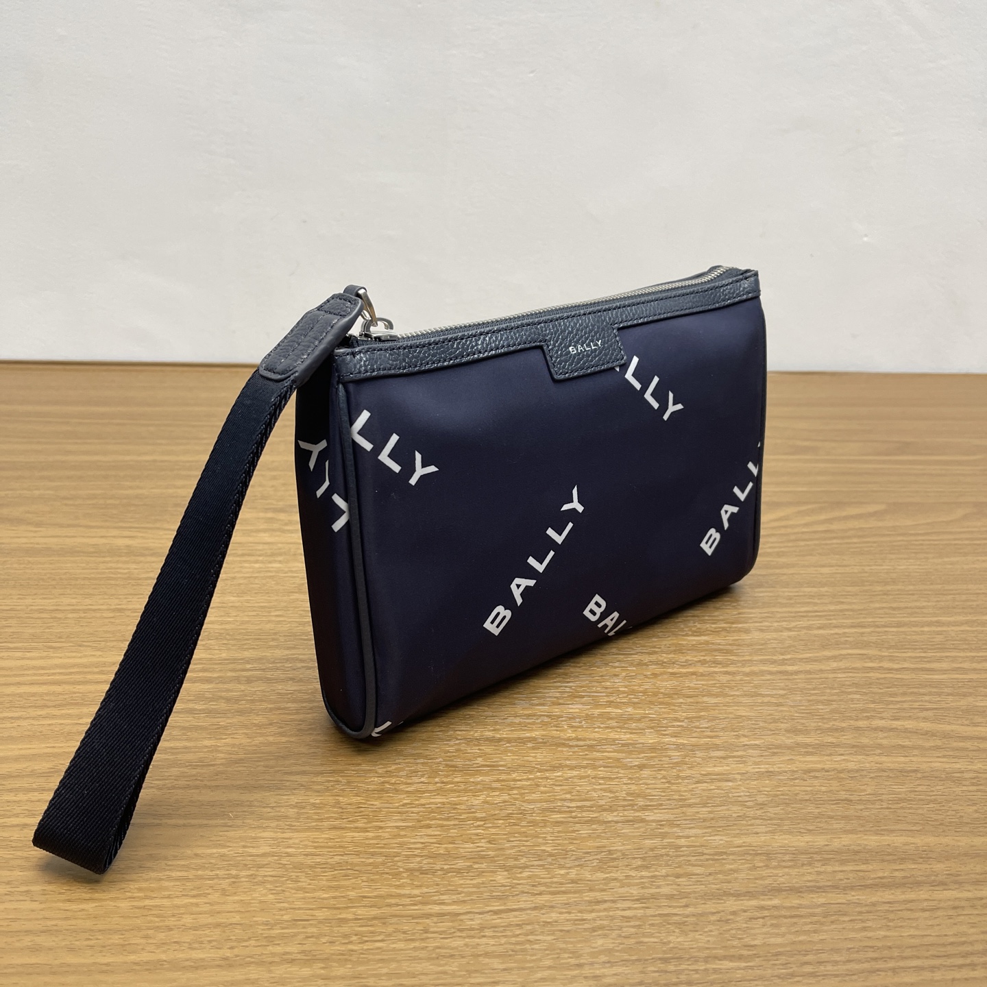 Bally Actual photo of blue clutch bag.