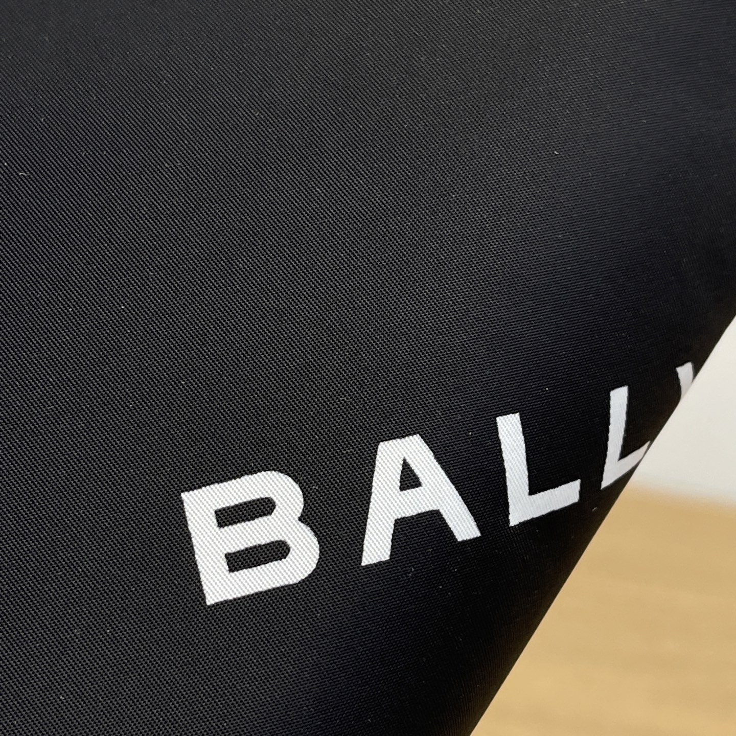 Bally Black clutch bag enlarged detail image.