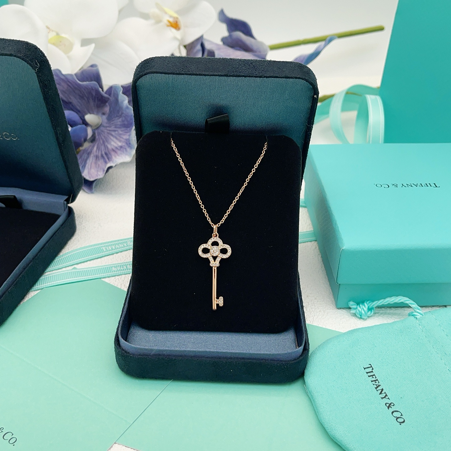 Tiffany Co Tiffany Keys Crown Key Pendant necklace 18k rose gold with clear diamond accents 18 inches