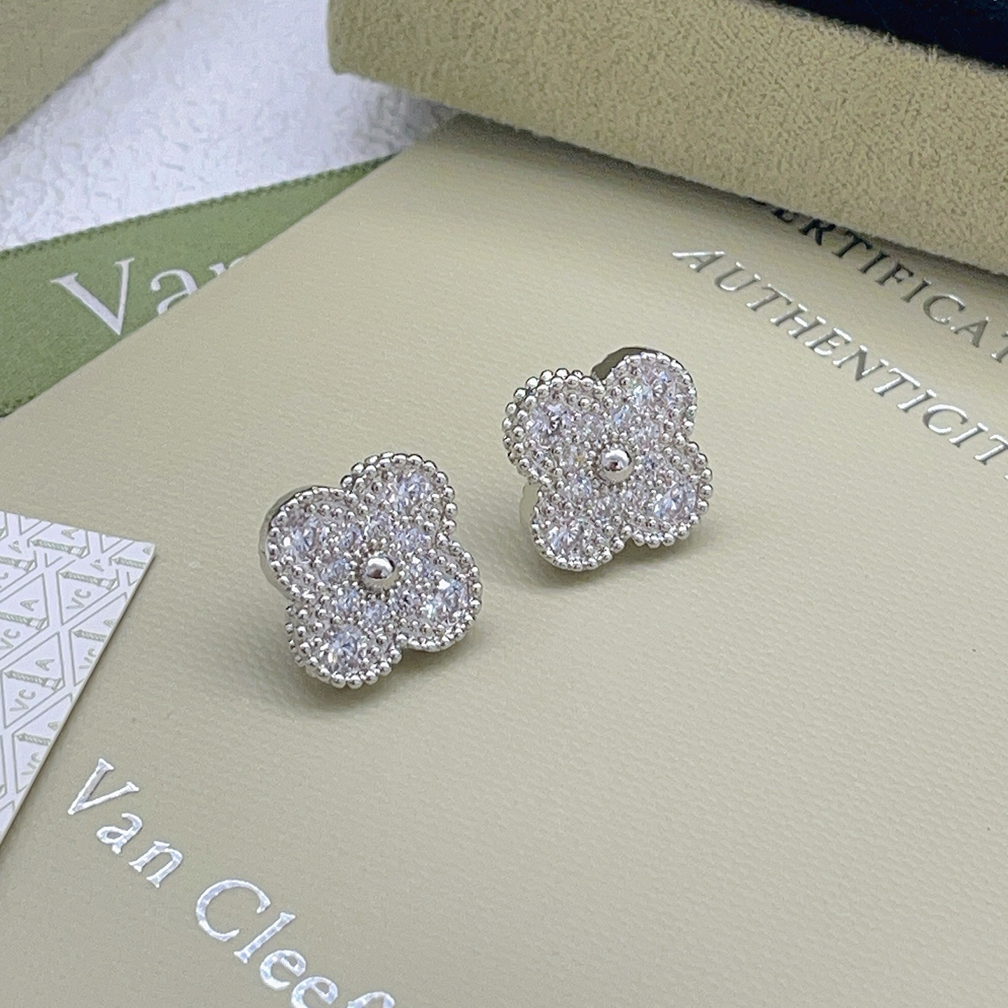 Van Cleef Arpels Alhambra earrings silver-toned white gold with clear diamond pave 9 5mm stud diameter