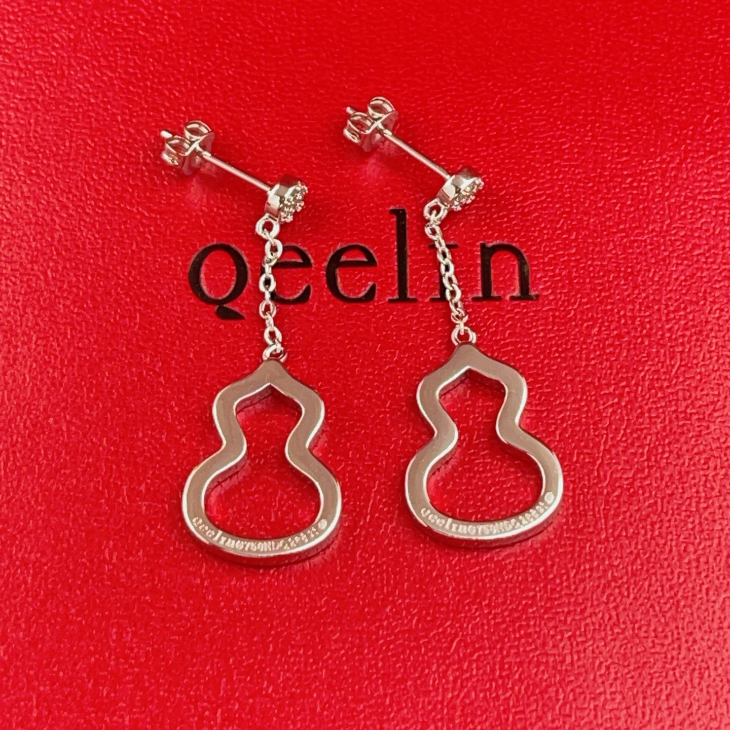 Qeelin Wulu earrings silver-toned white gold with clear diamond accents 2 5cm drop length