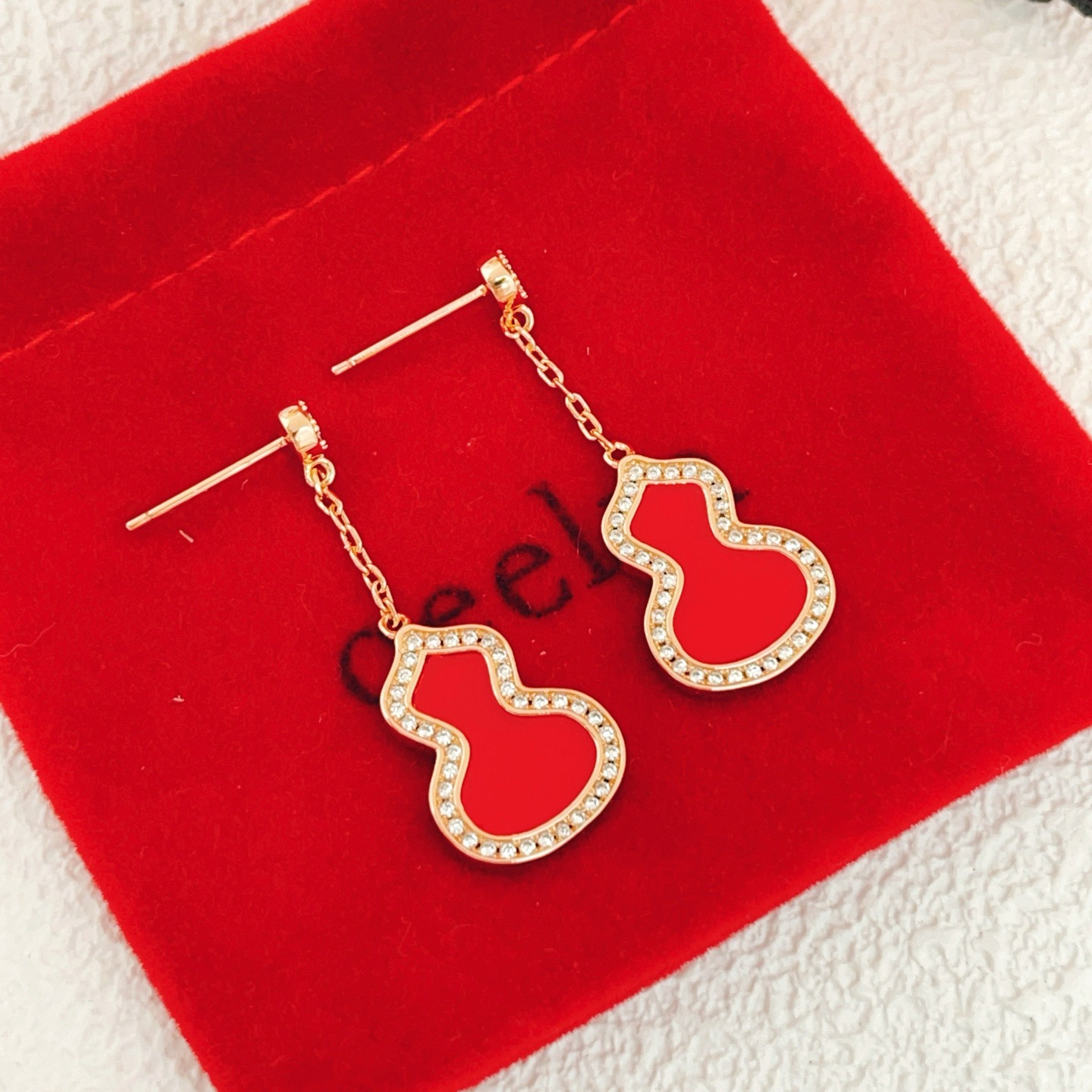 Qeelin Wulu earrings Rose gold metal red carnelian inlay clear diamond accents 3 5cm drop length