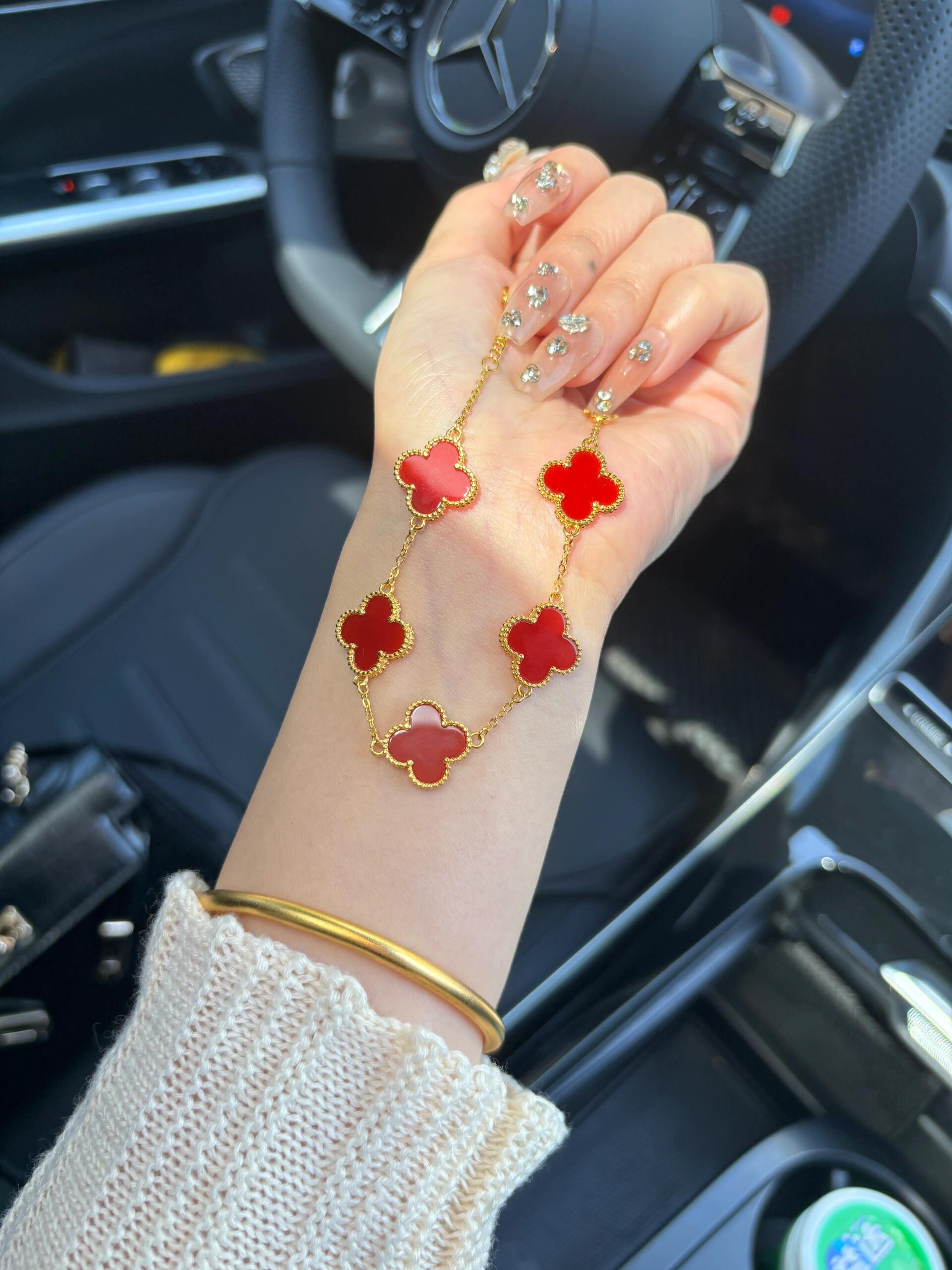 Van Cleef Arpels Alhambra bracelet yellow gold with carnelian red clover motifs 19cm