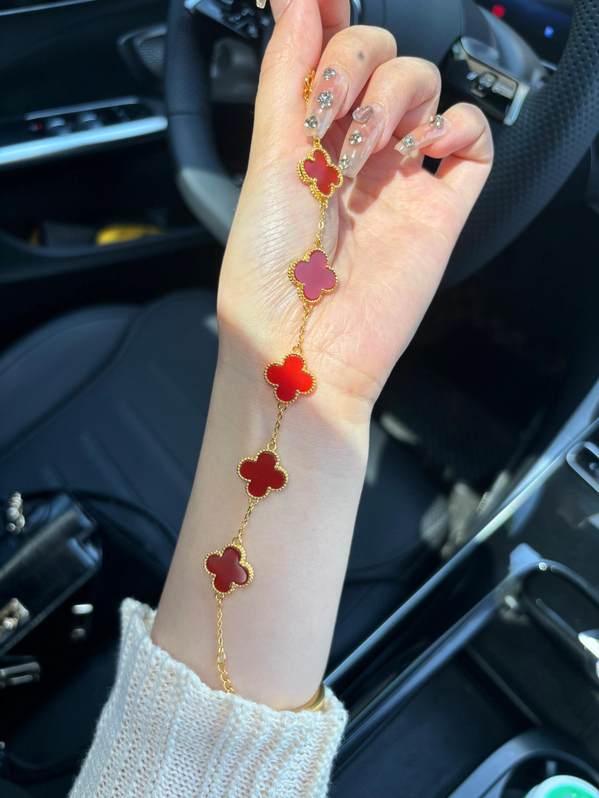 Van Cleef Arpels Alhambra bracelet yellow gold with carnelian red clover motifs 19cm