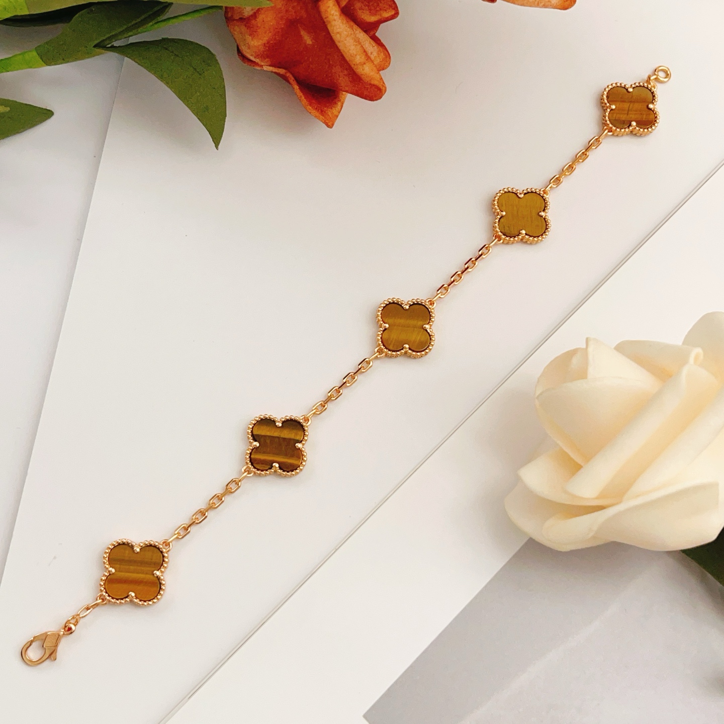Van Cleef Arpels Vintage Alhambra bracelet Rose gold with brown tiger s eye stone inlays 18cm