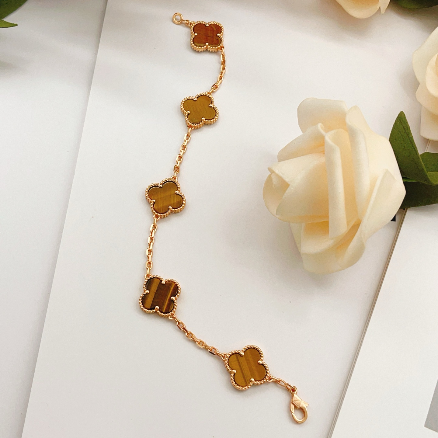 Van Cleef Arpels Vintage Alhambra bracelet Rose gold with brown tiger s eye stone inlays 18cm