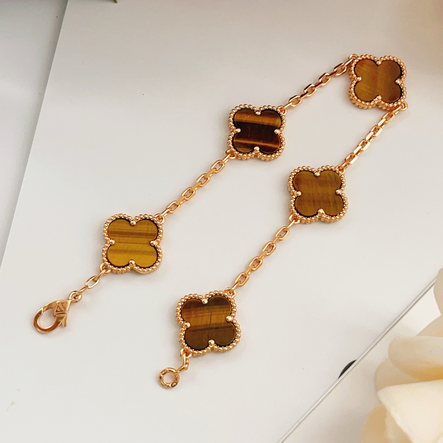 Van Cleef Arpels Vintage Alhambra bracelet Rose gold with brown tiger s eye stone inlays 18cm